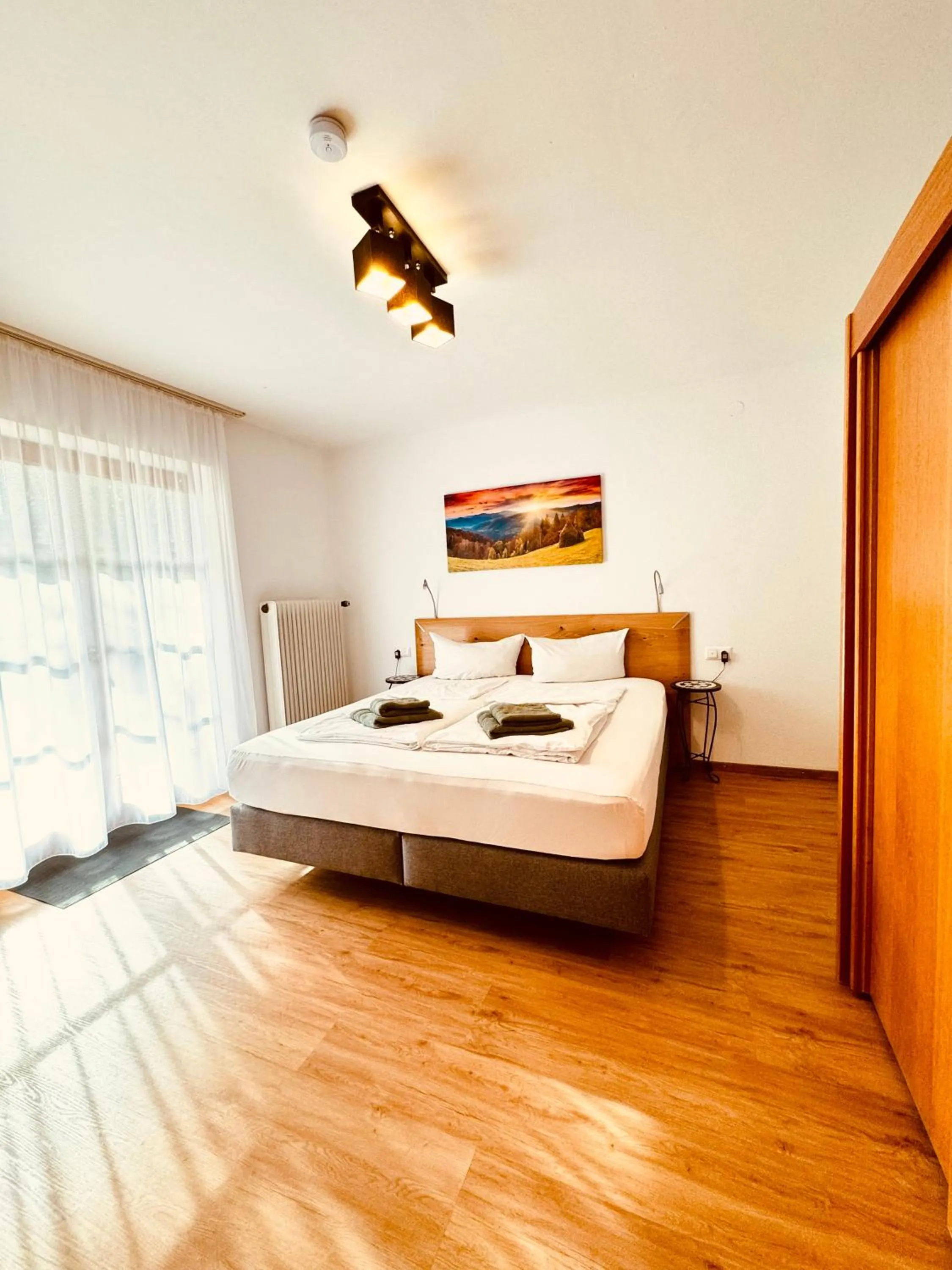 Bed in Appartement-Hotel-Allgayer