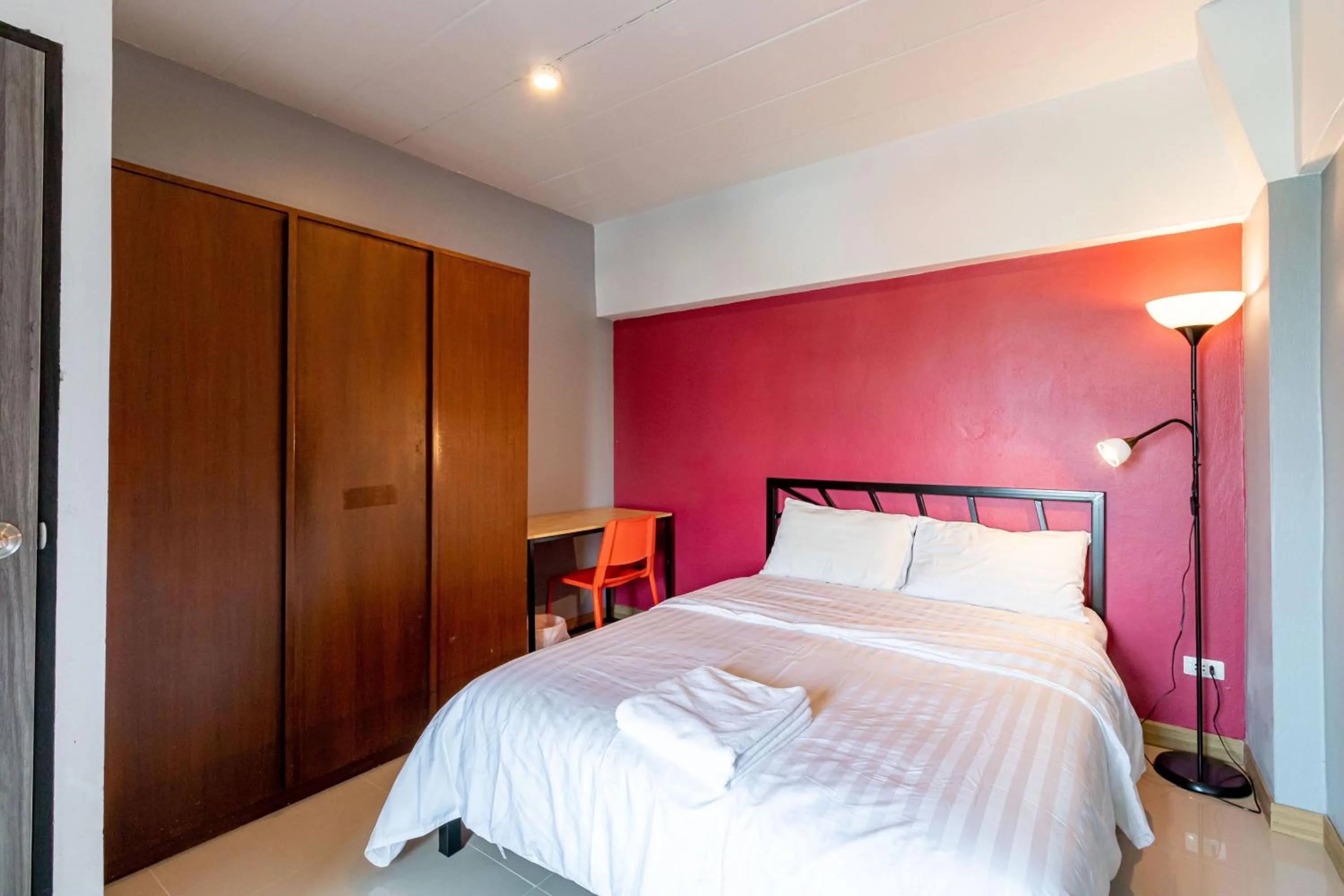 Photo of the whole room, Bed in Living Naraa Place