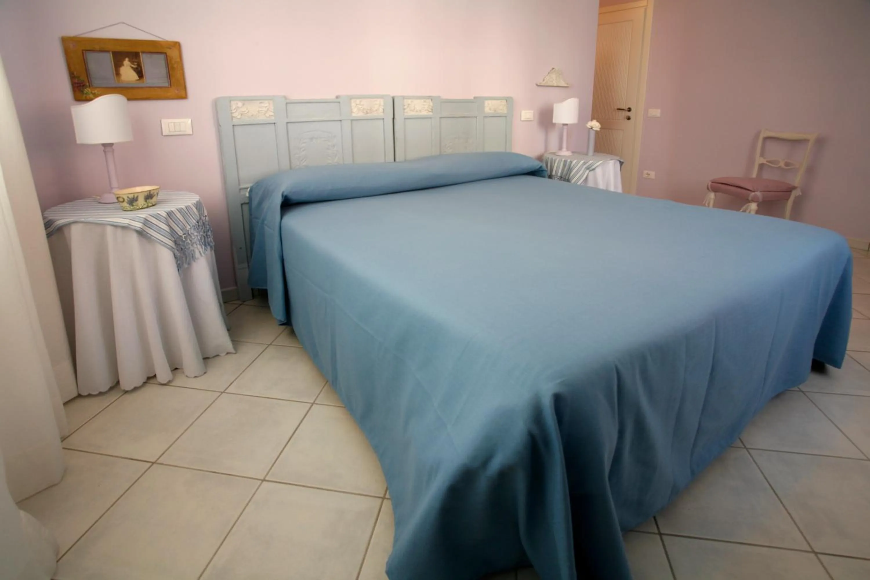 Bed in Villa Amelia Rooms