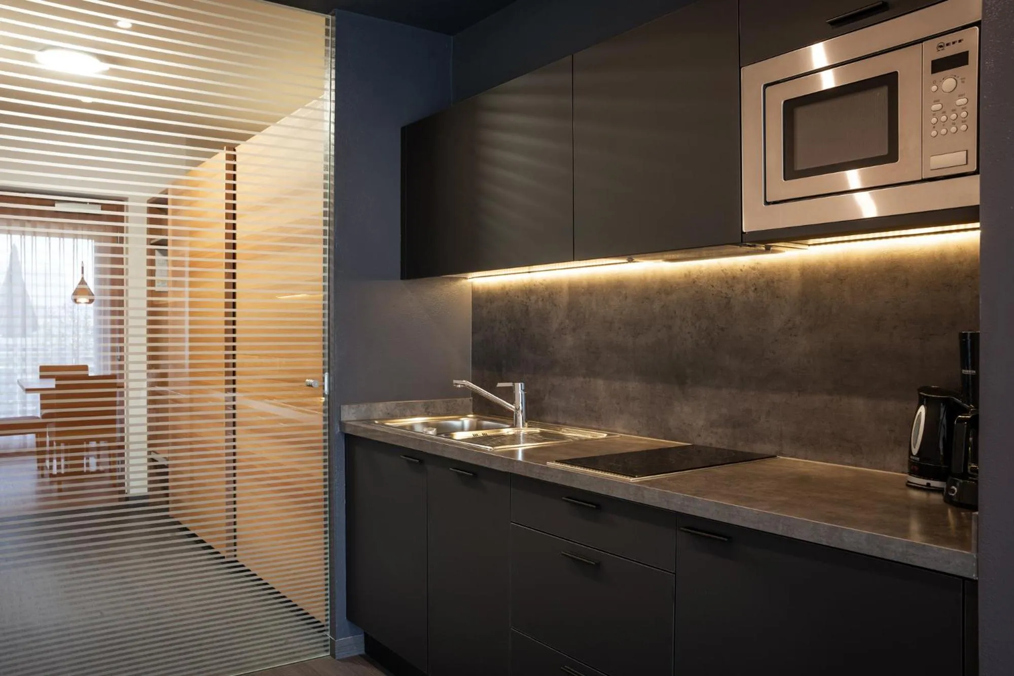 Kitchen or kitchenette in Alagundis Apartment Residence