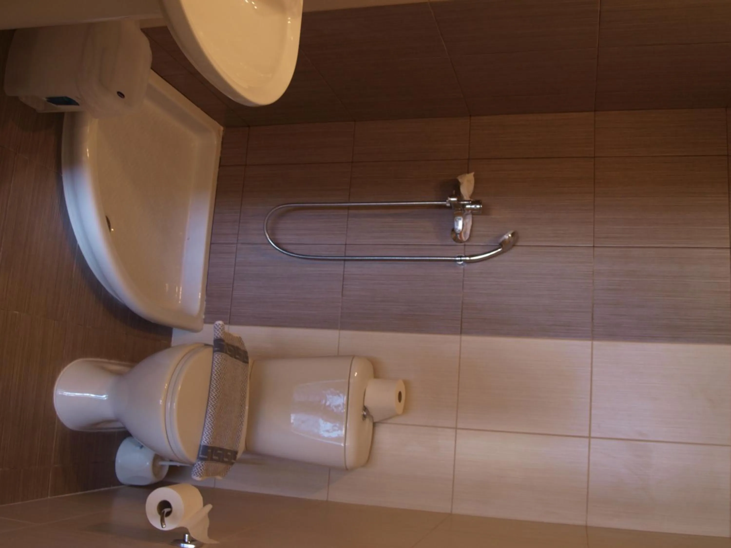 Bathroom in Carina Hotel