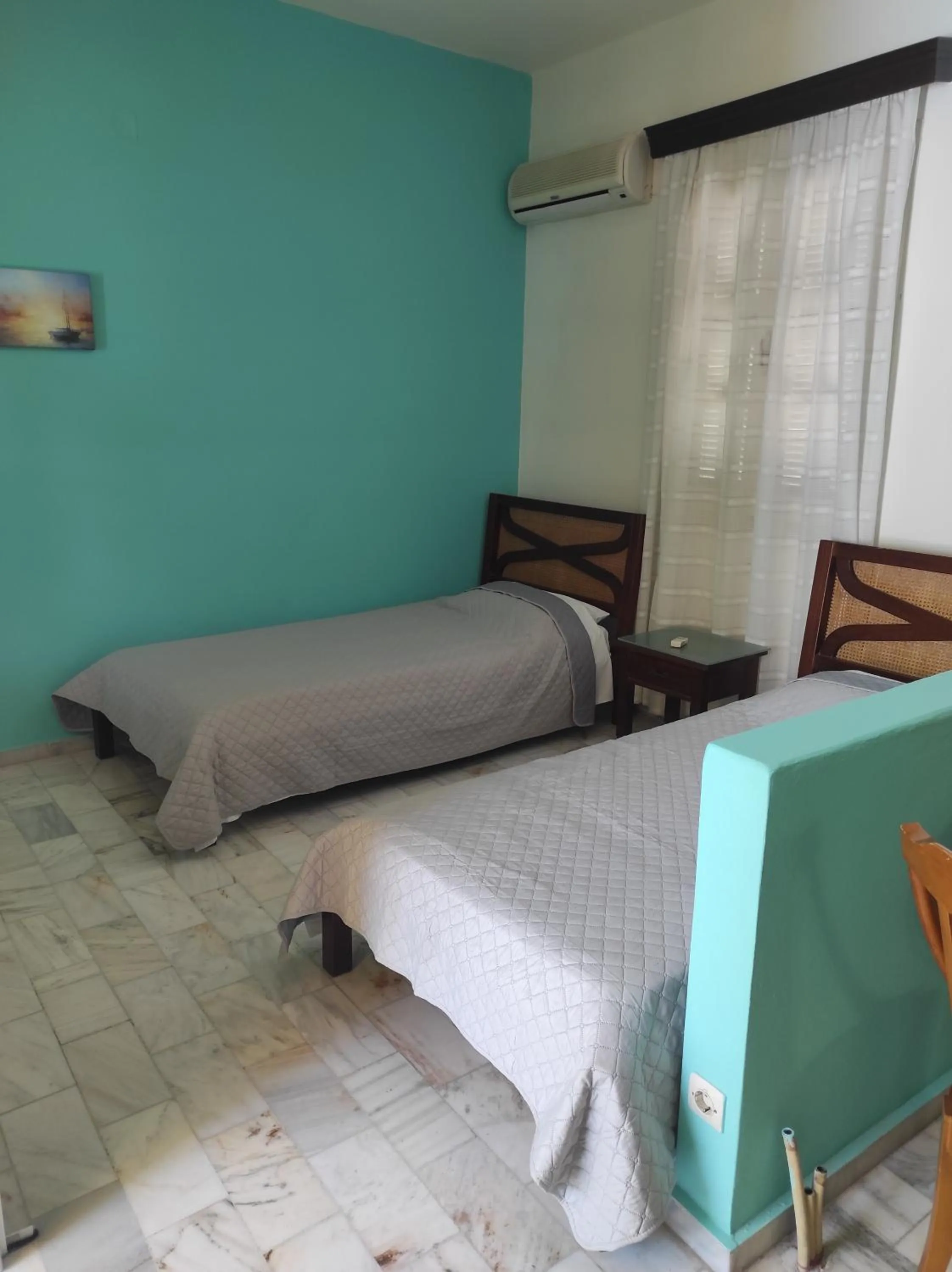 Bed in Villa Melina Hotel