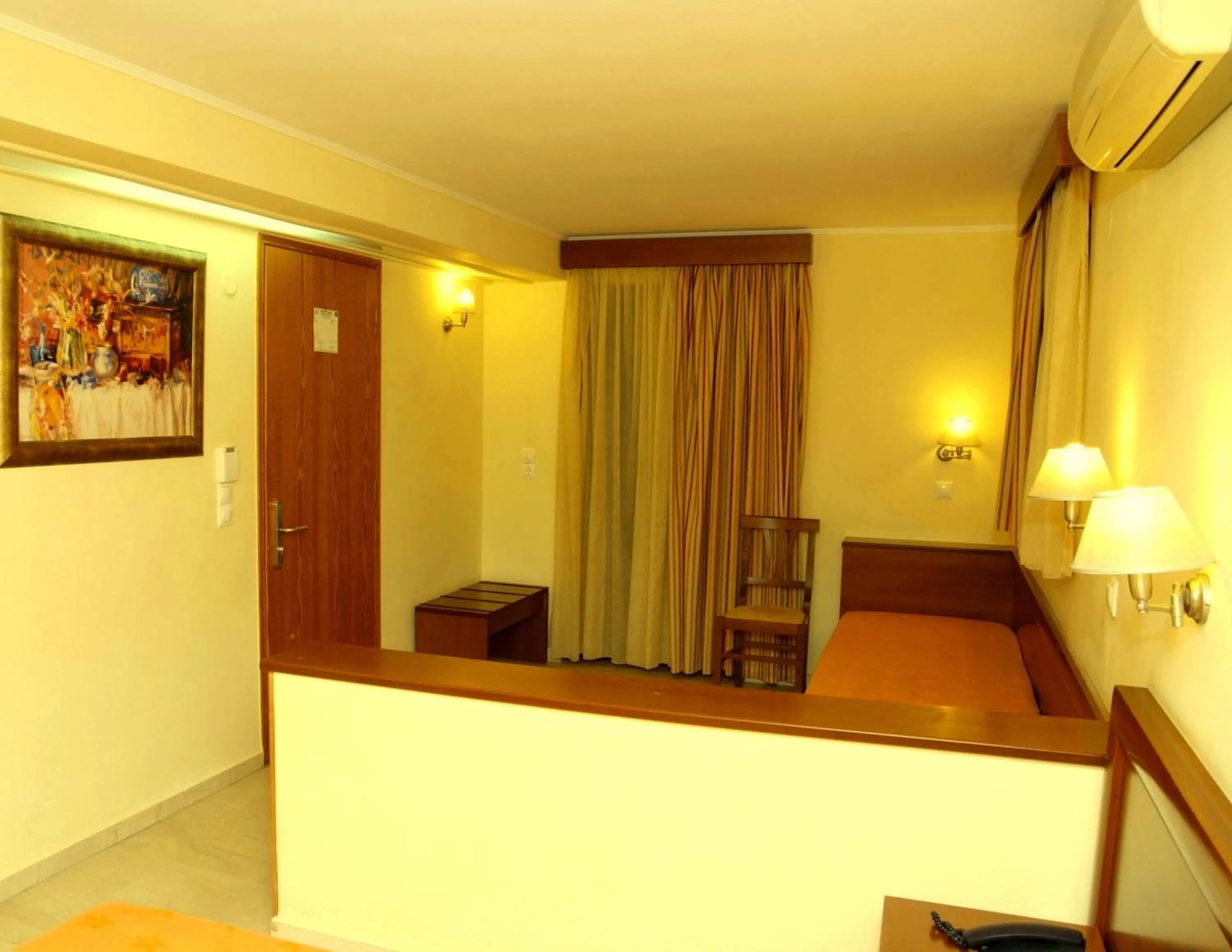 Seating area, Bed in Elysee Hotel