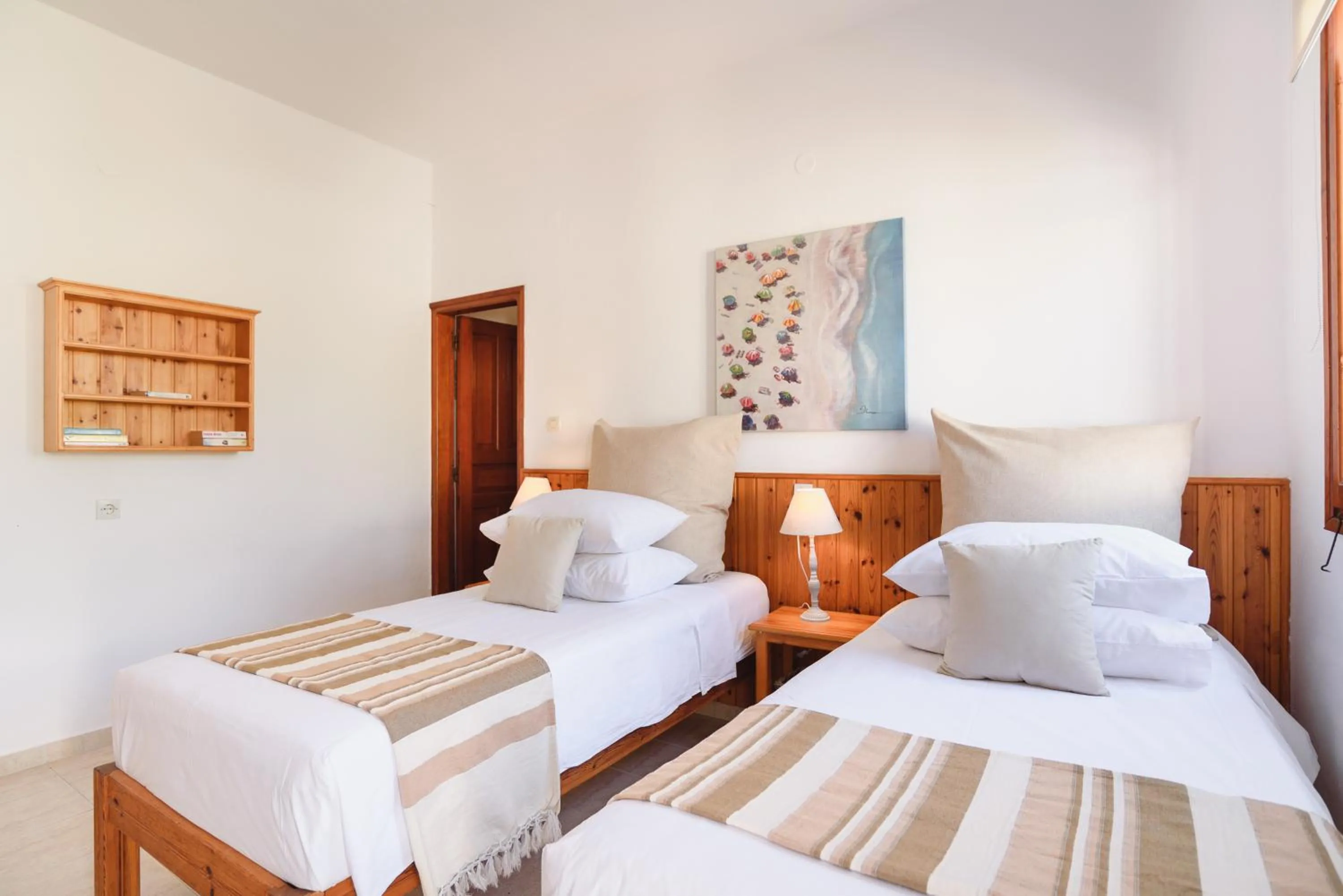 Bed in Thea Villas and Suite