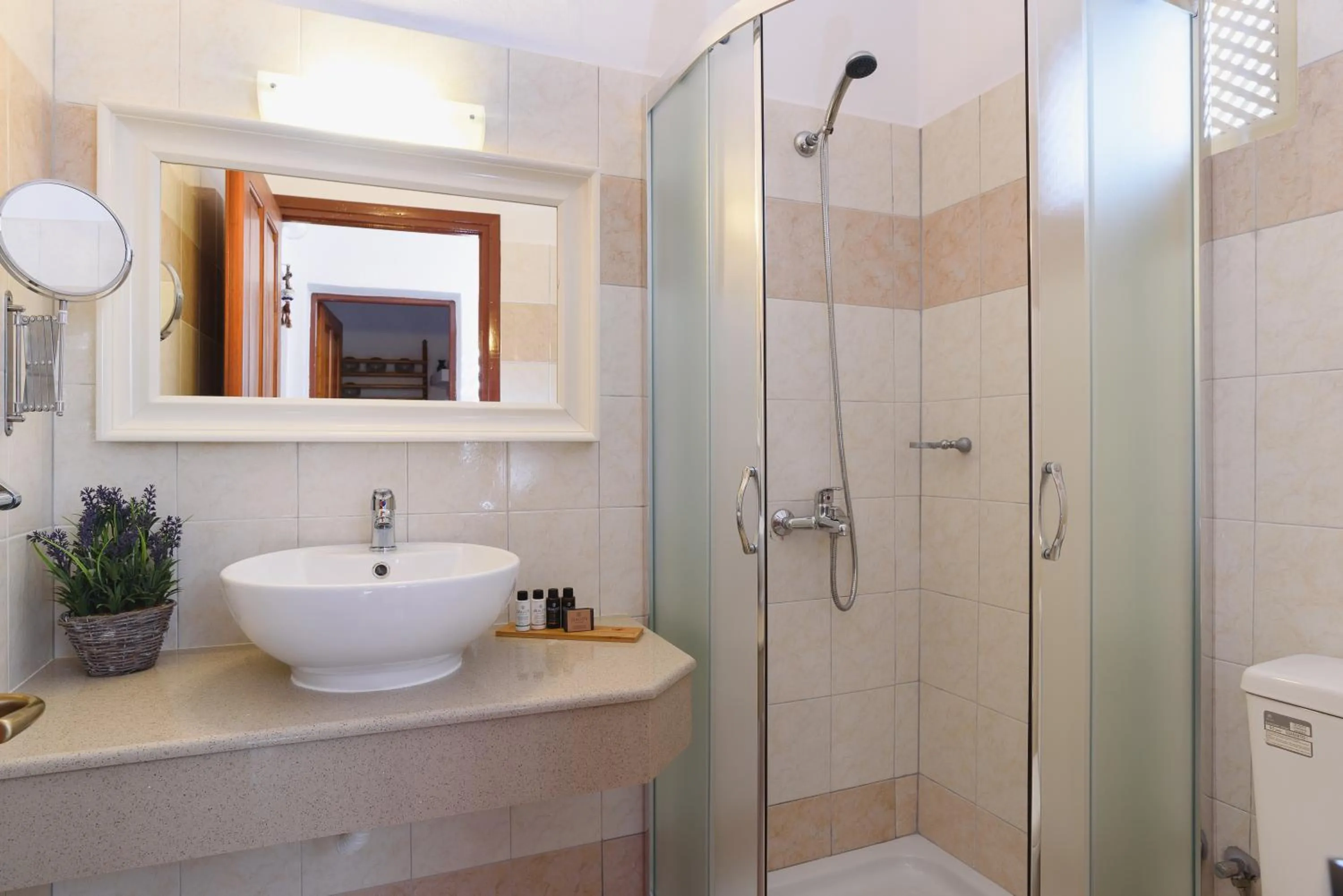 Bathroom in Thea Villas and Suite