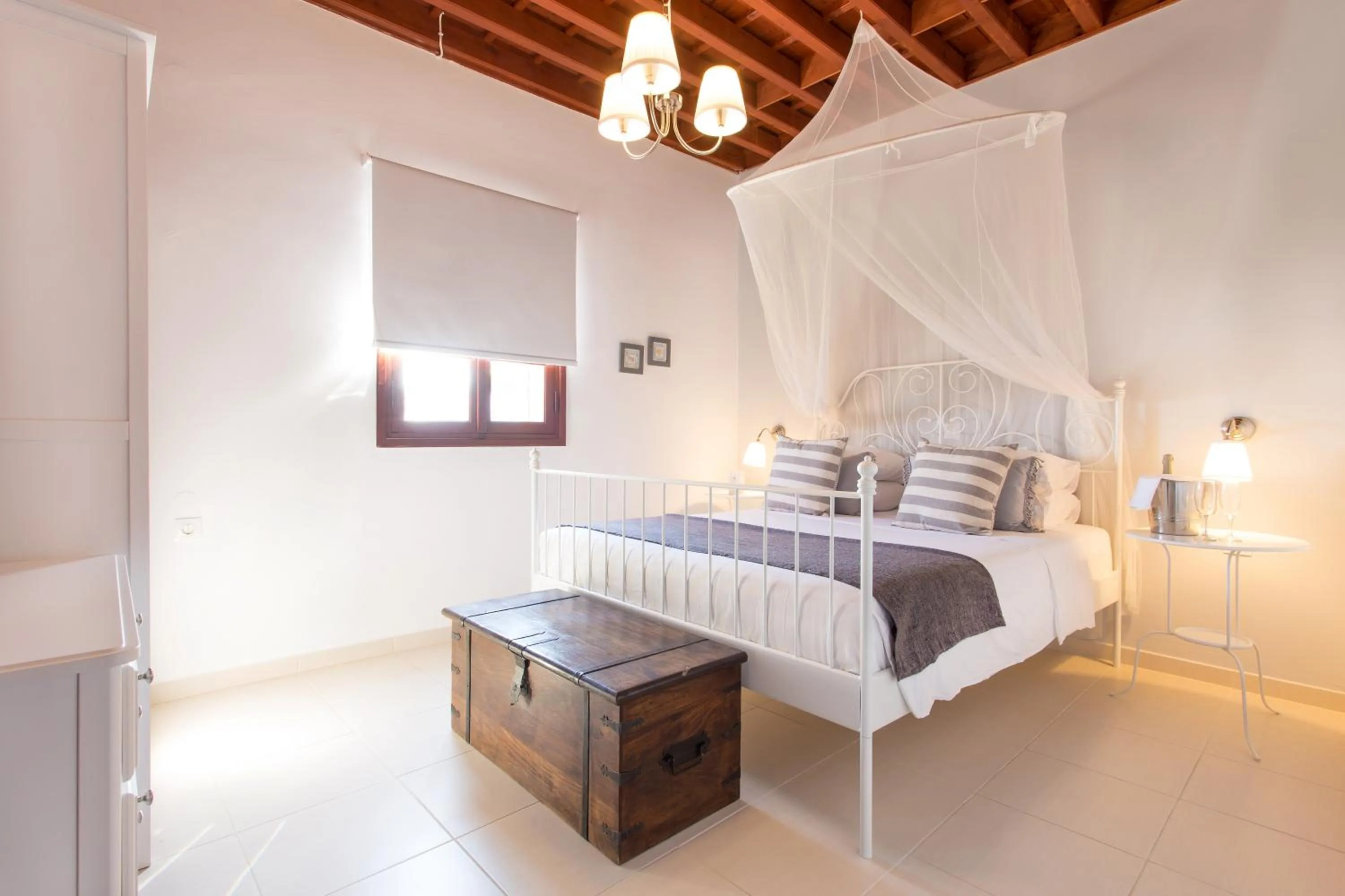 Bed in Thea Villas and Suite