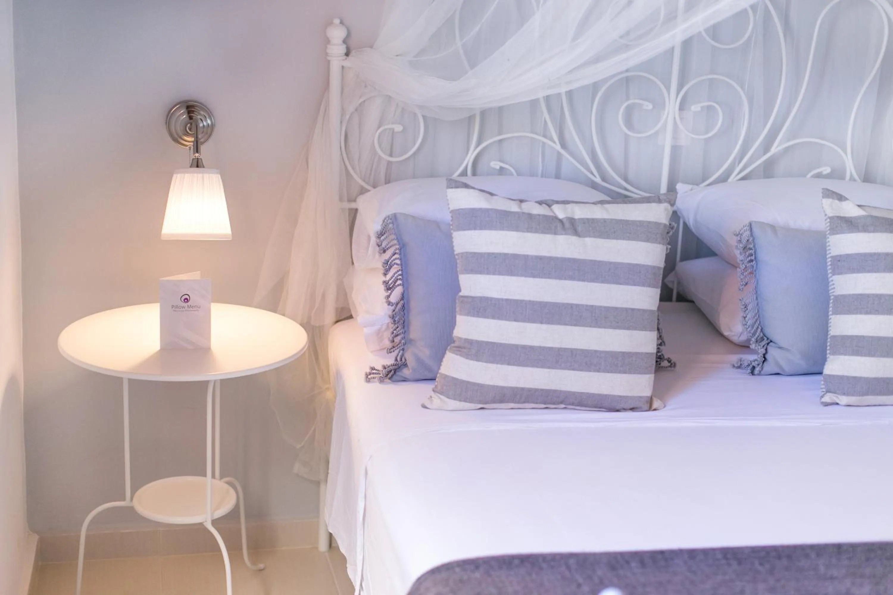 Bed in Thea Villas and Suite