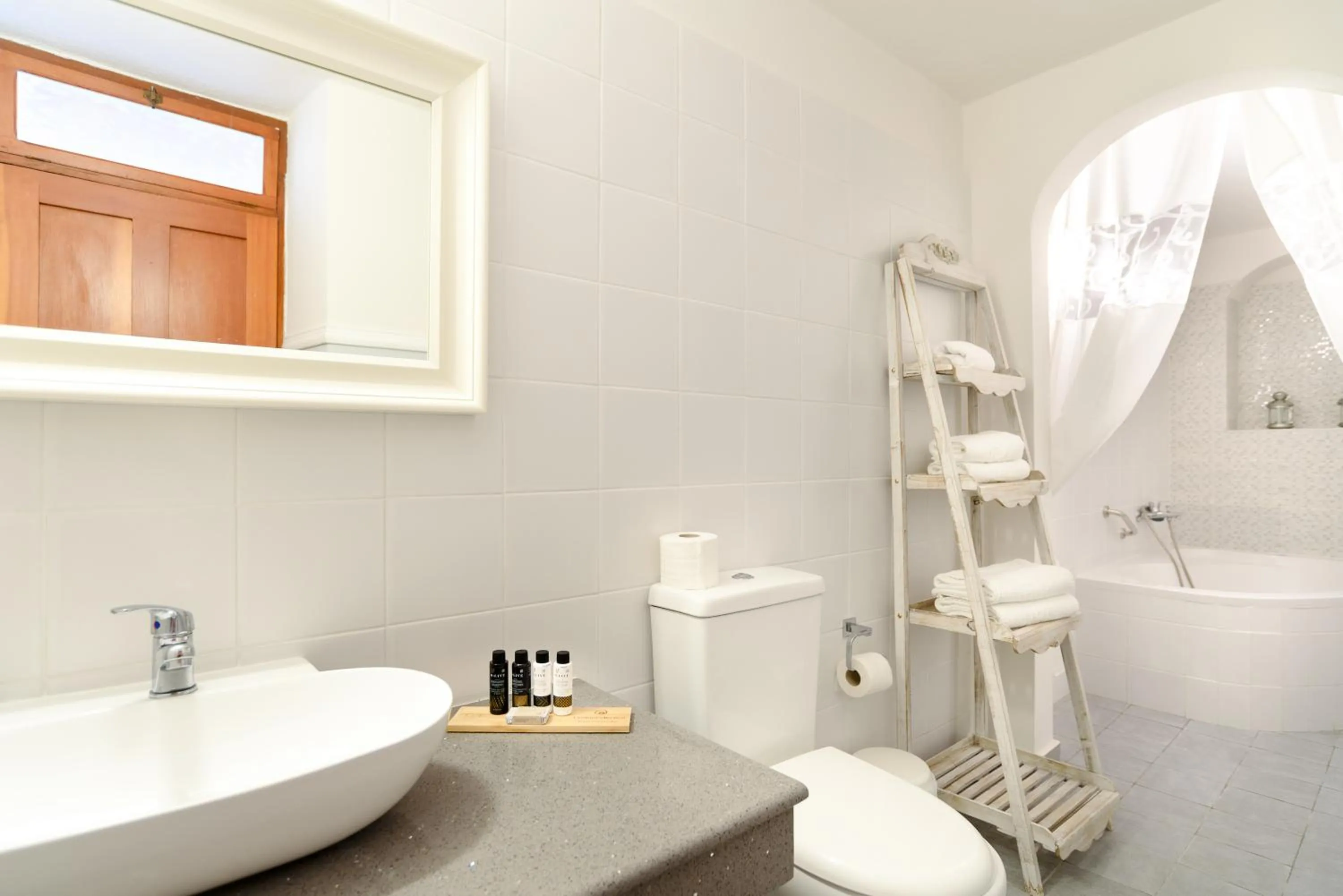 Toilet in Thea Villas and Suite