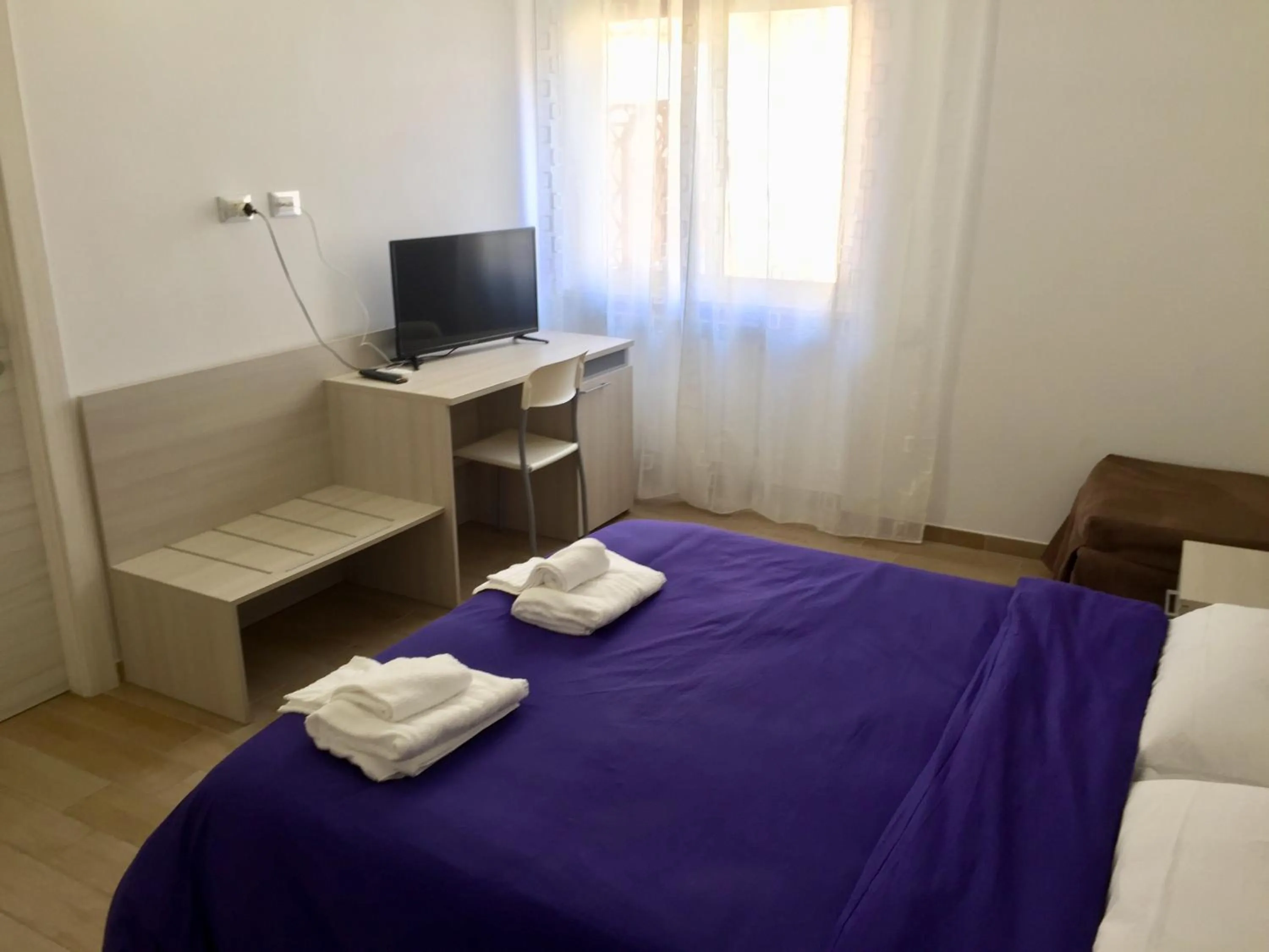 Bed in Il Viaggiatore Via Rimini Serapo