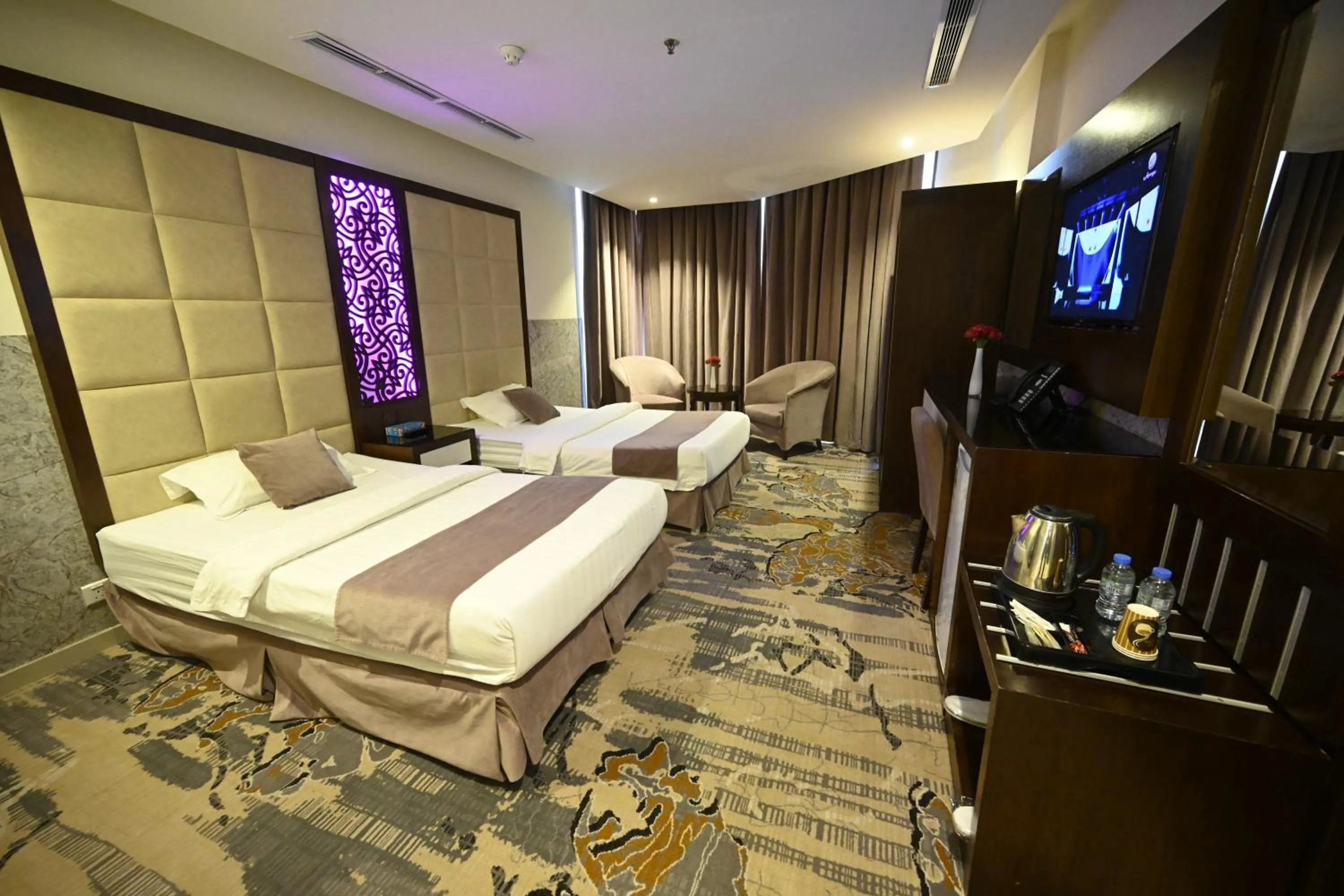 Bedroom in Aster Hotel