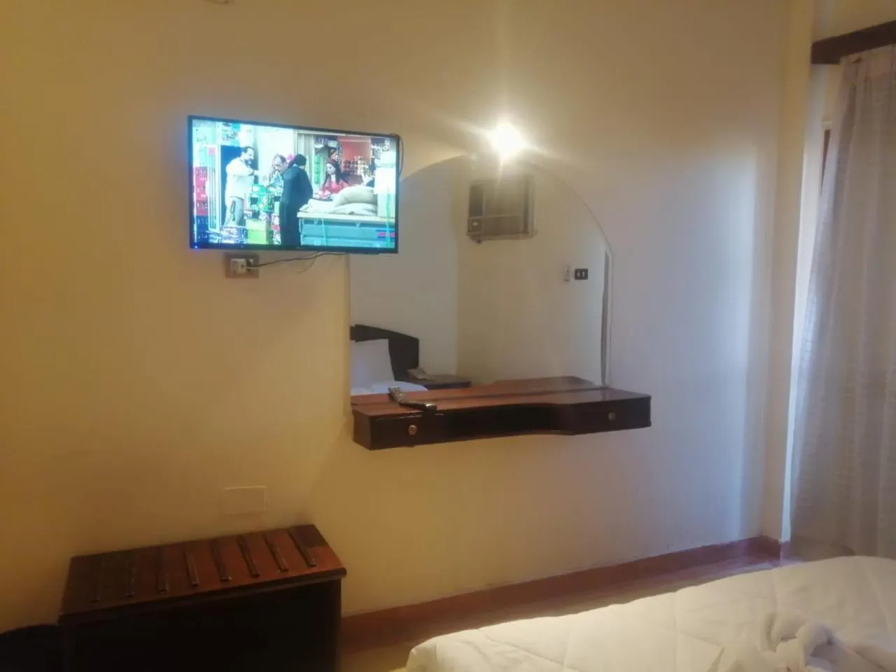 Communal lounge/ TV room, Bed in Eiffel Hotel Hurghada