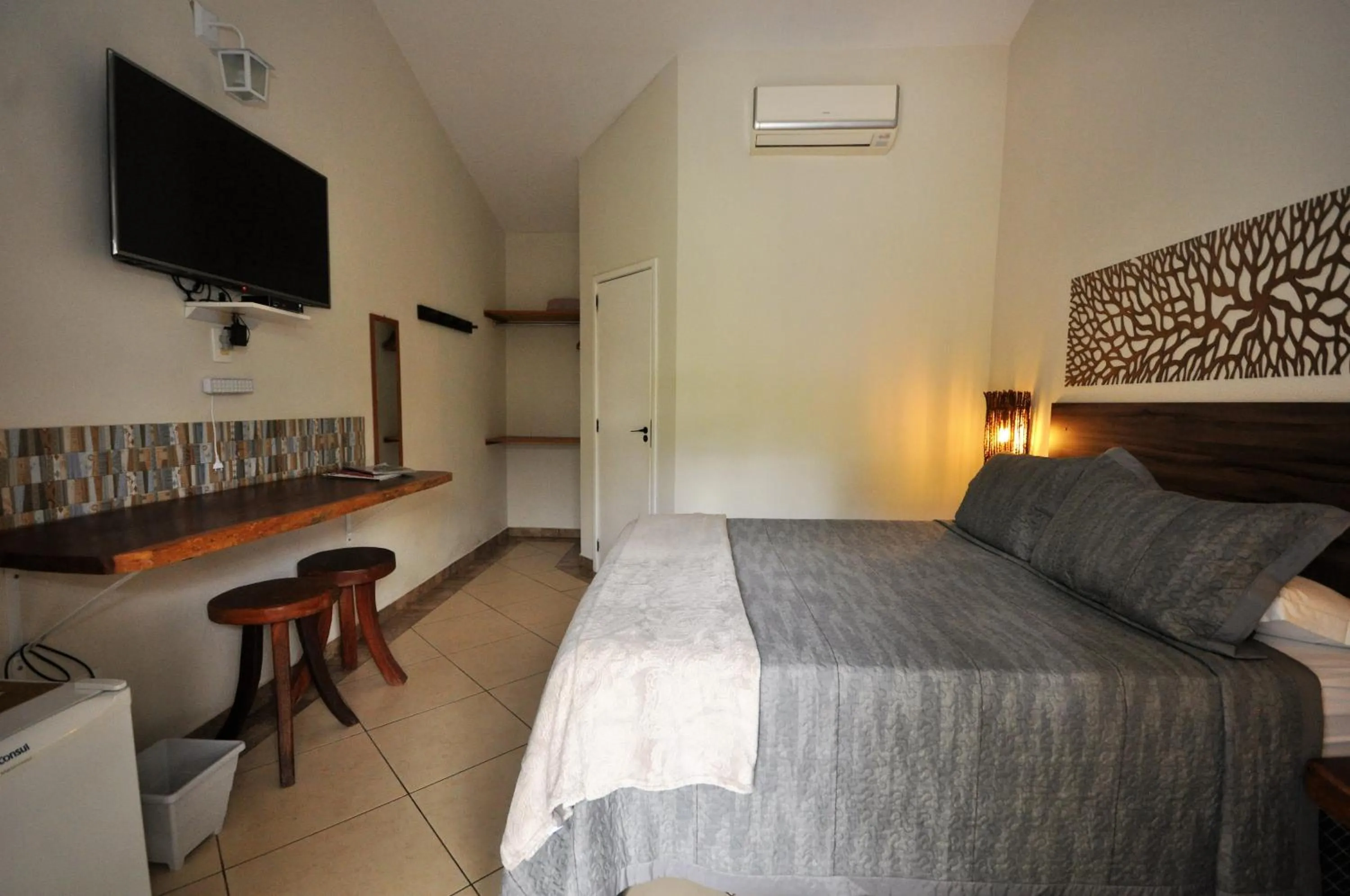 Bed in Pousada Flores do Cerrado