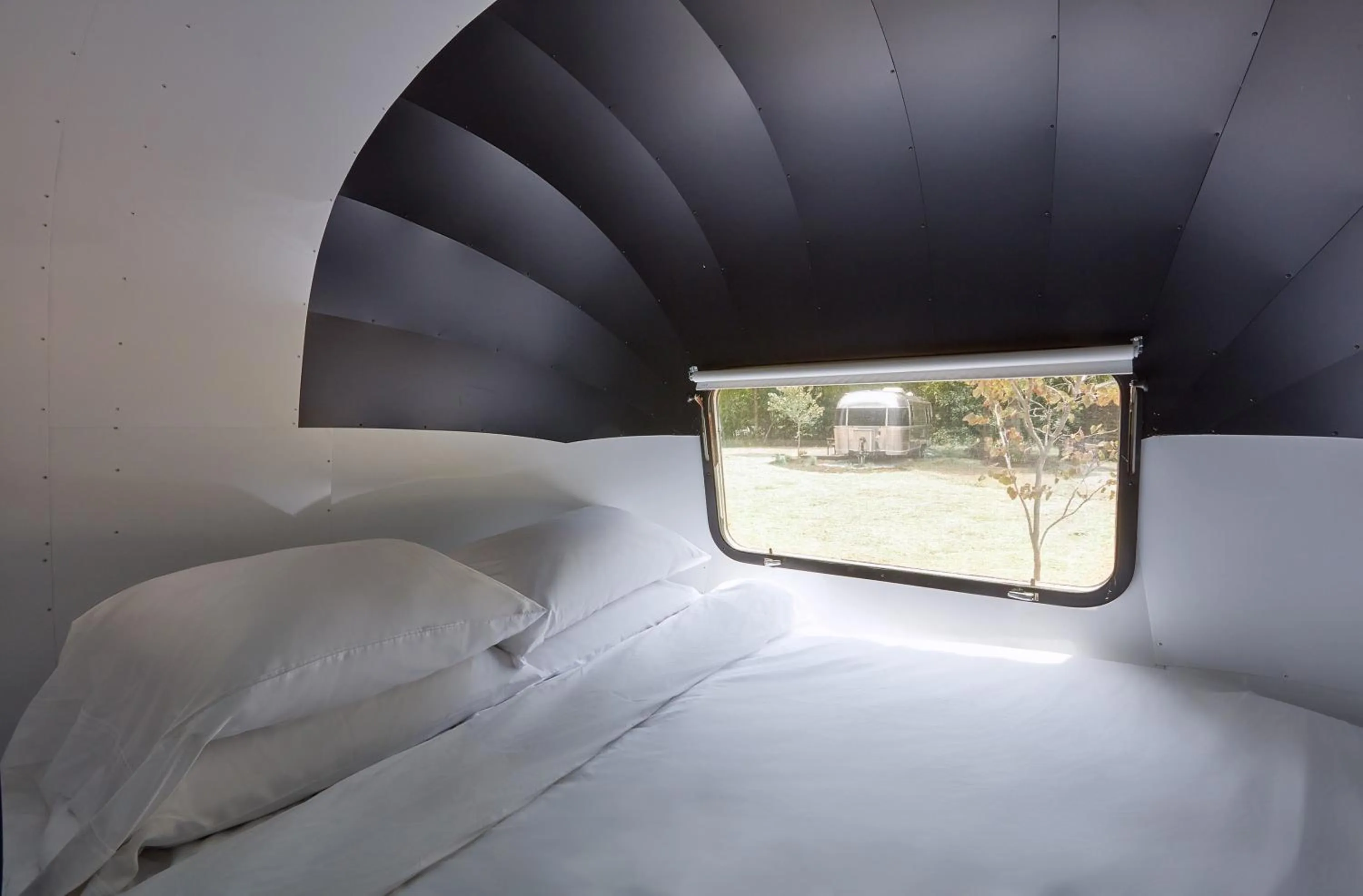 Bed in Asheville River Cabins