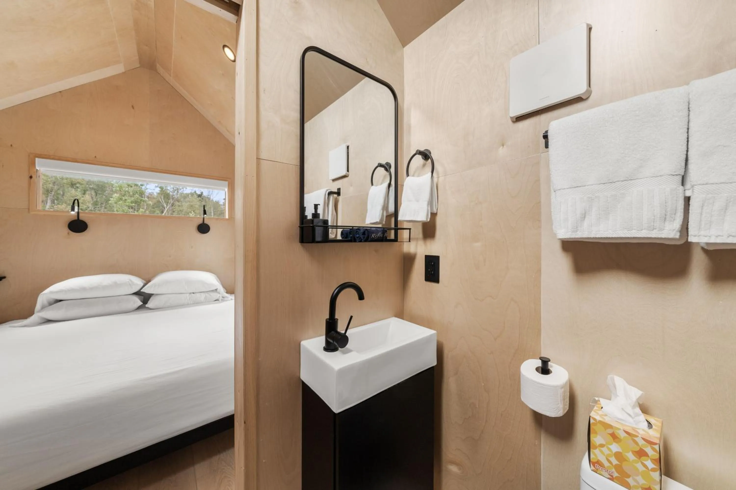 Bed in Asheville River Cabins