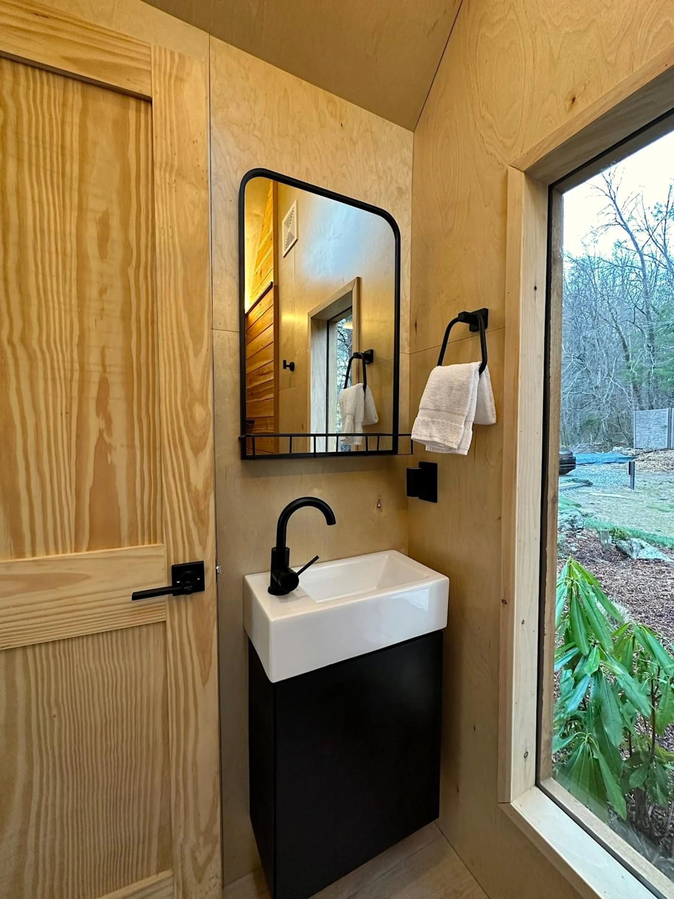 Bed in Asheville River Cabins