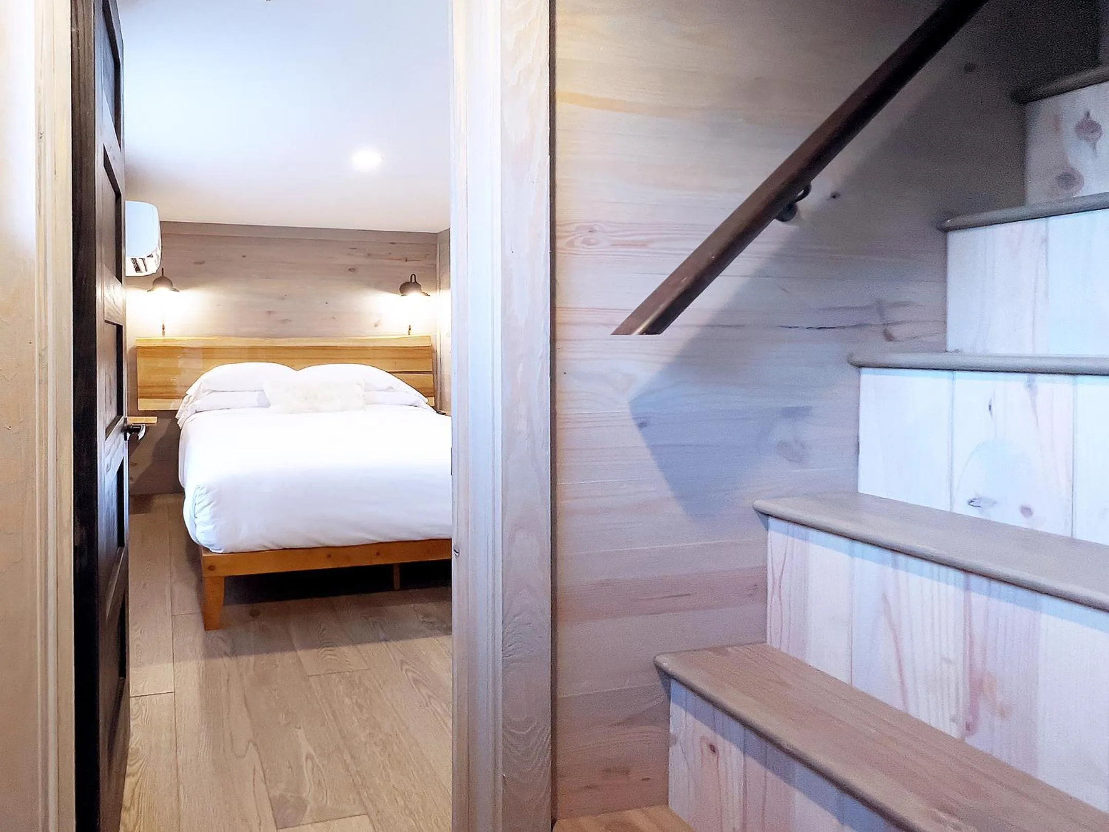 Bed in Asheville River Cabins