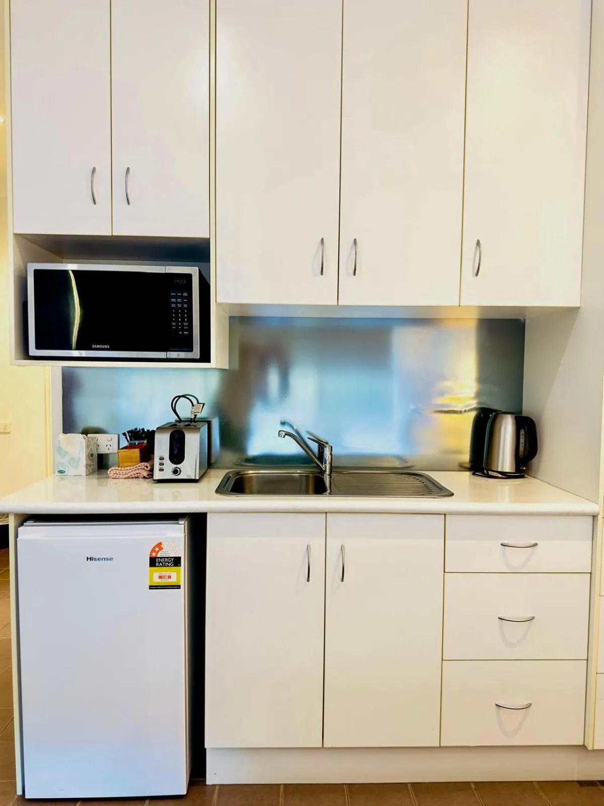 Kitchen or kitchenette in Merivale Motel
