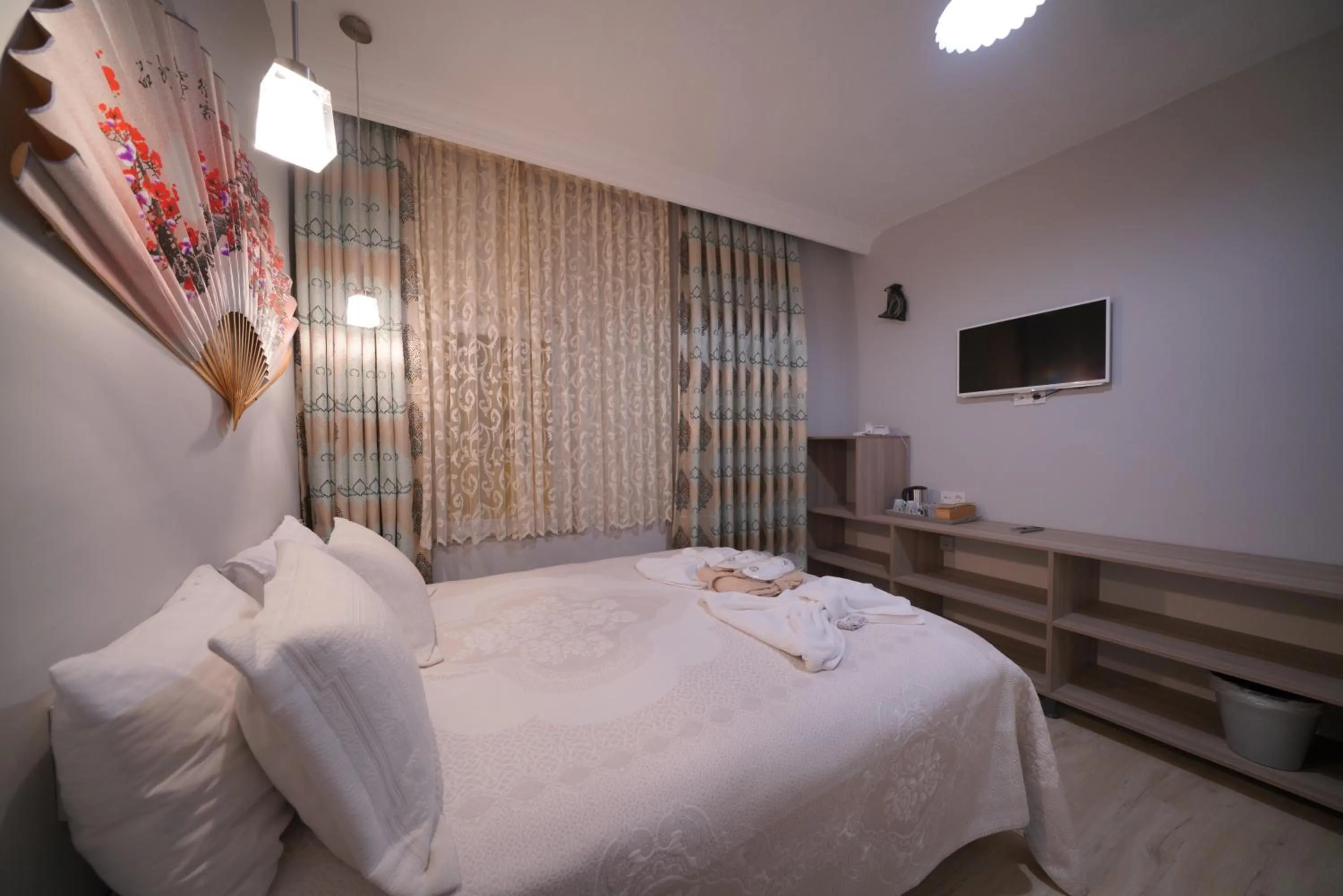 Bed in Pashabelle Hotel