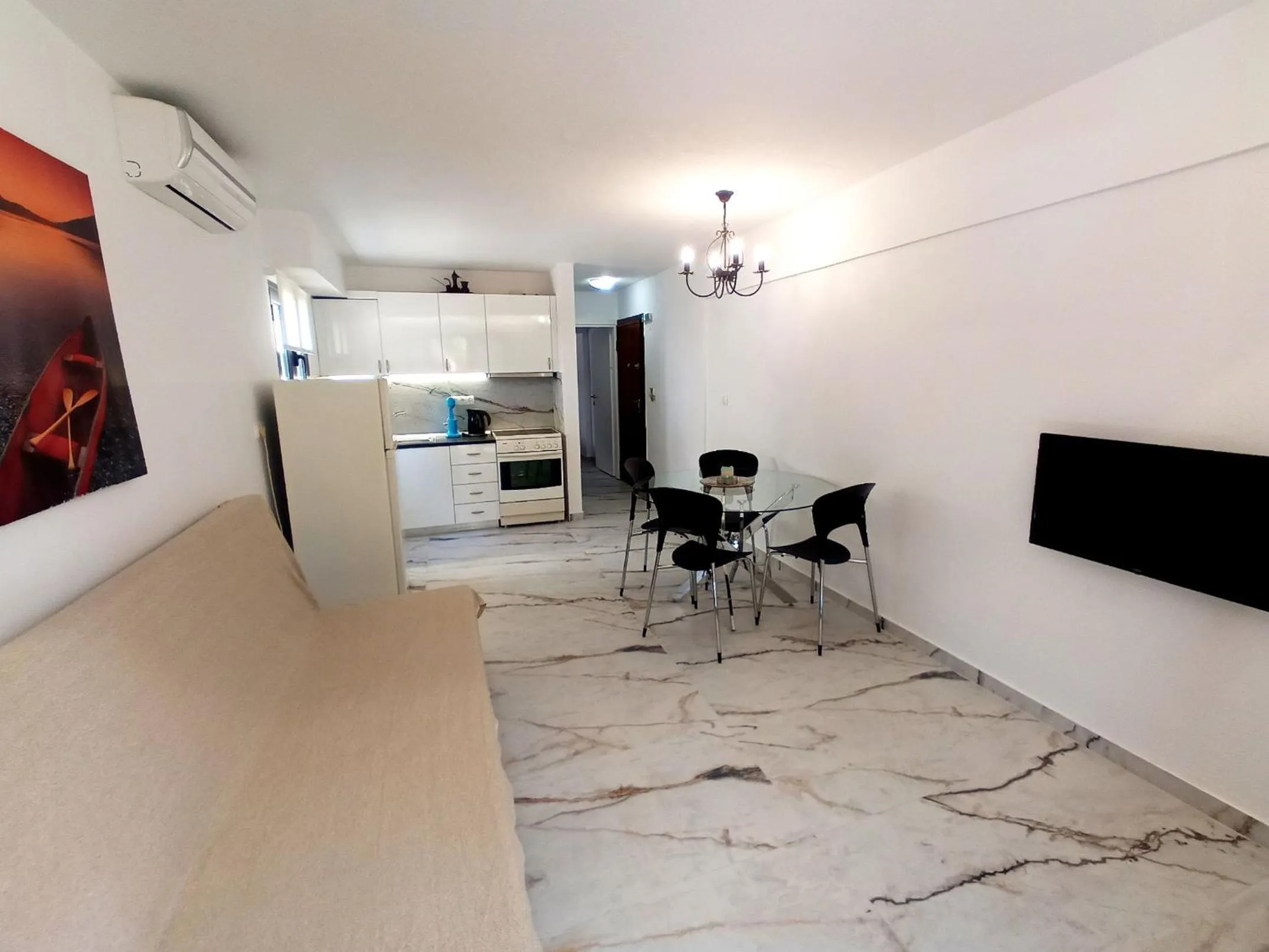 TV and multimedia in Salonikiou Beach Apartments & Villas