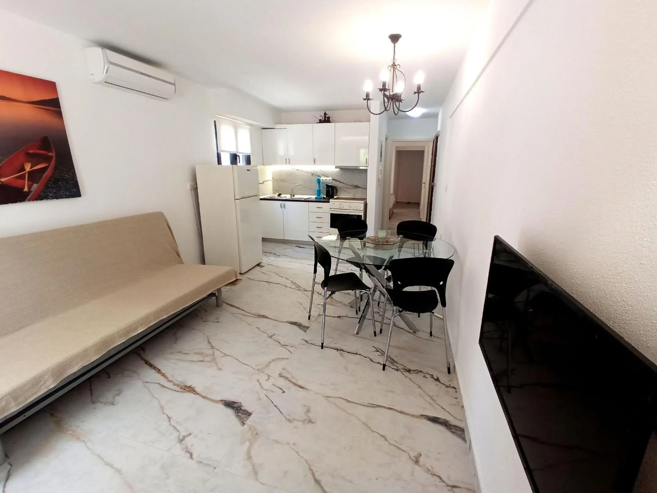 Kitchen or kitchenette in Salonikiou Beach Apartments & Villas