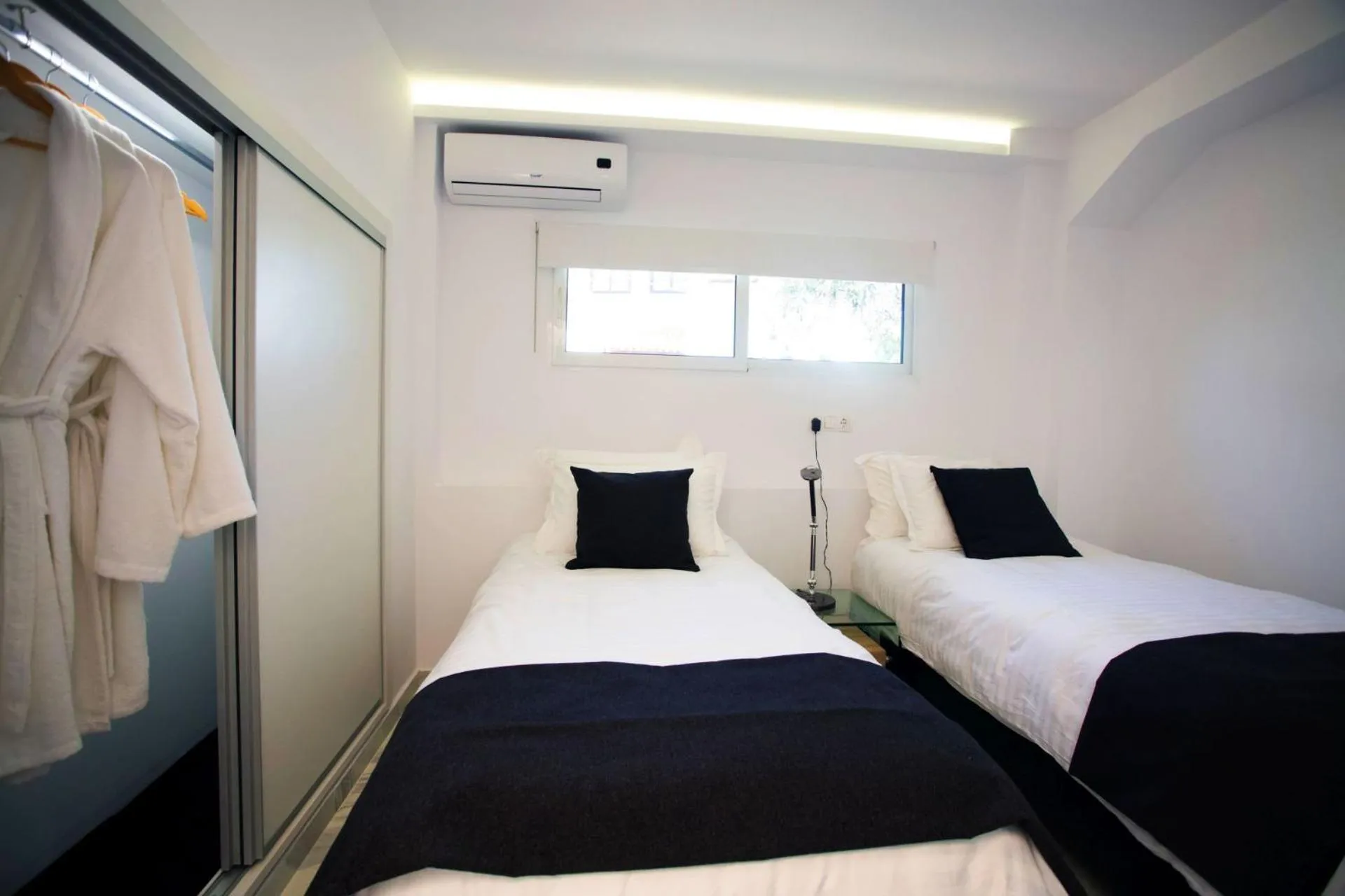 Bed in Salonikiou Beach Apartments & Villas