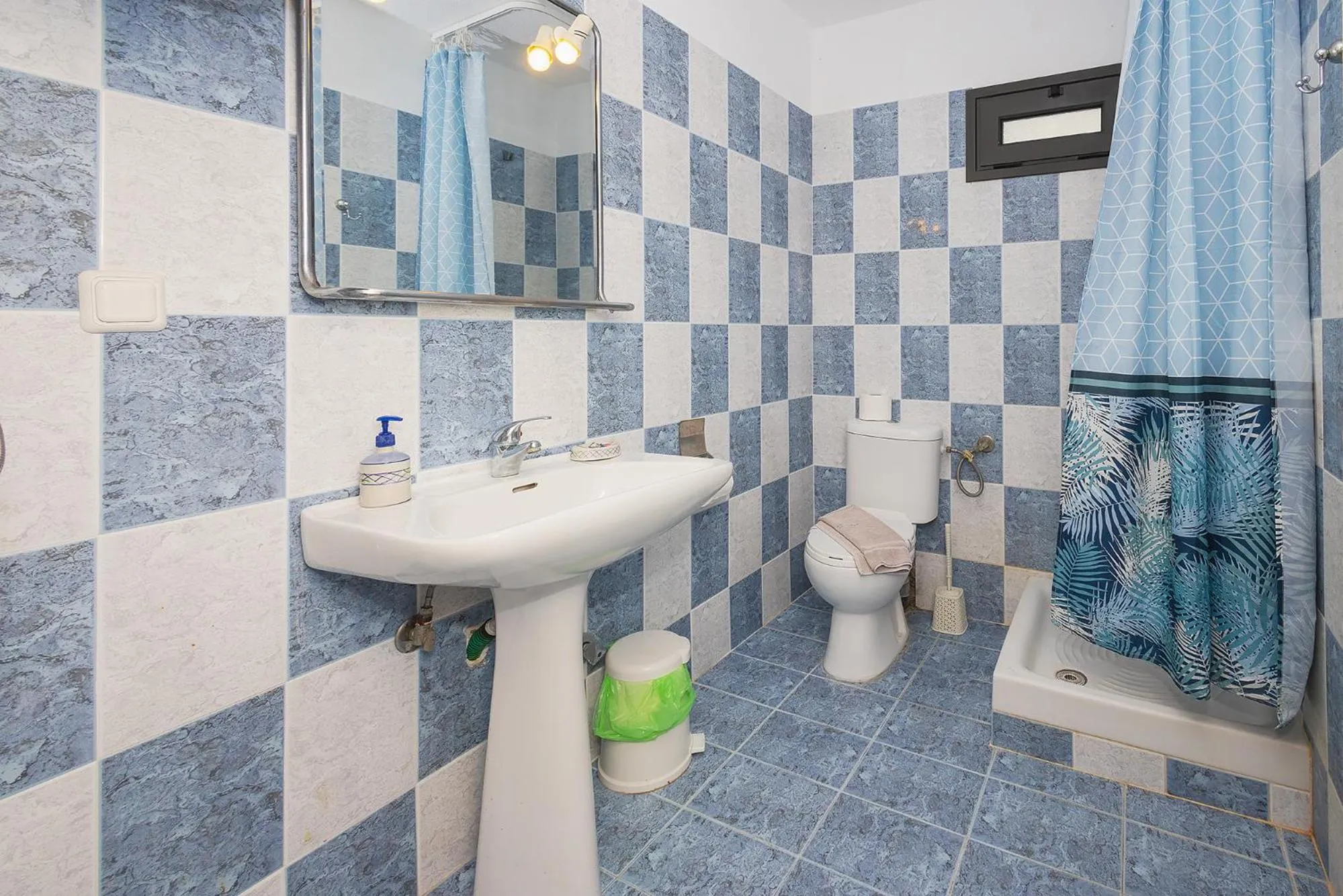 Shower in Salonikiou Beach Apartments & Villas