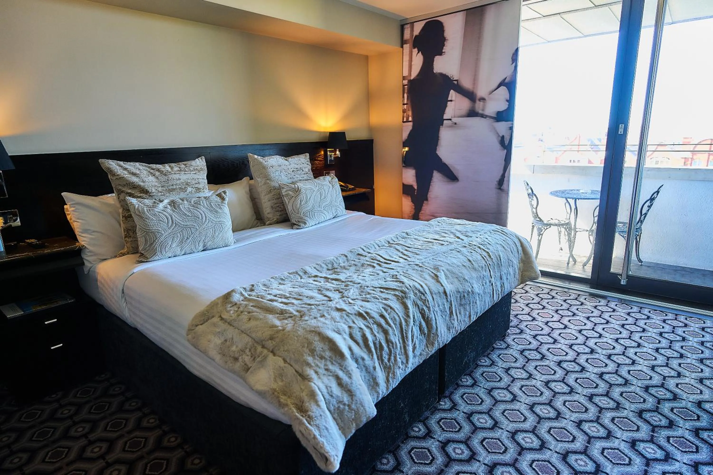 Bed in The Vincent Hotel