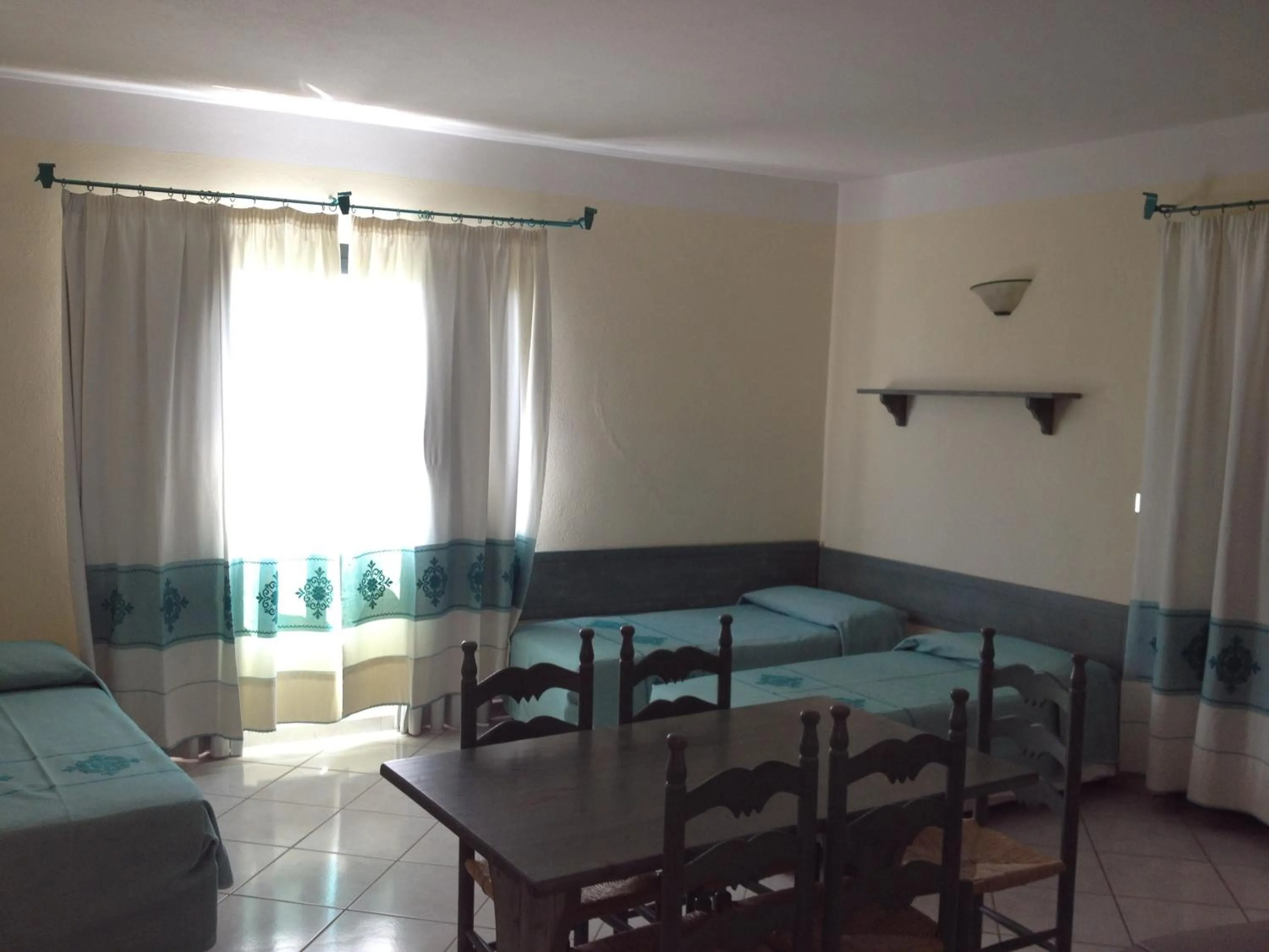 Living room, Bed in Residence Marina Palace