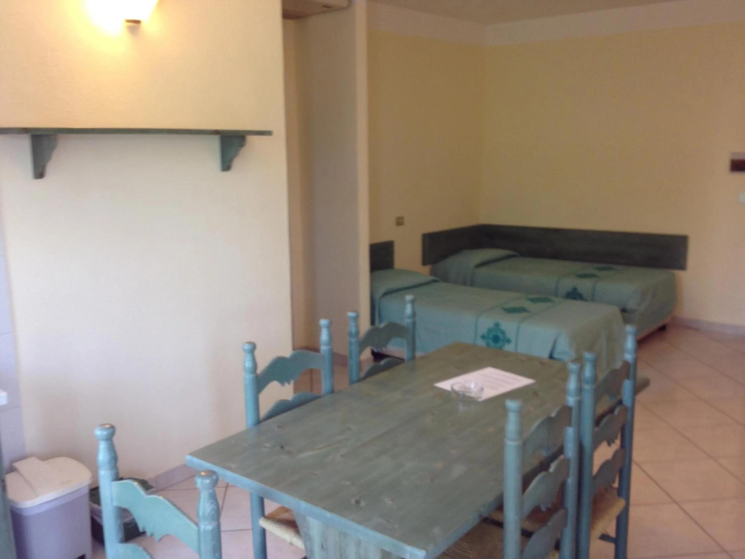 Dining area, Bed in Residence Marina Palace