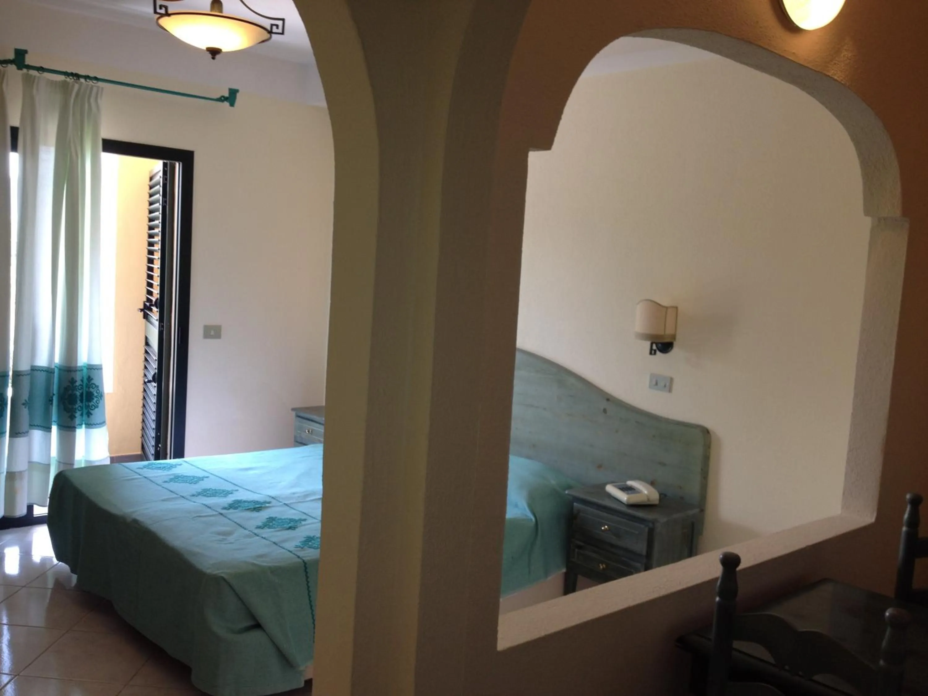 Photo of the whole room, Bed in Residence Marina Palace