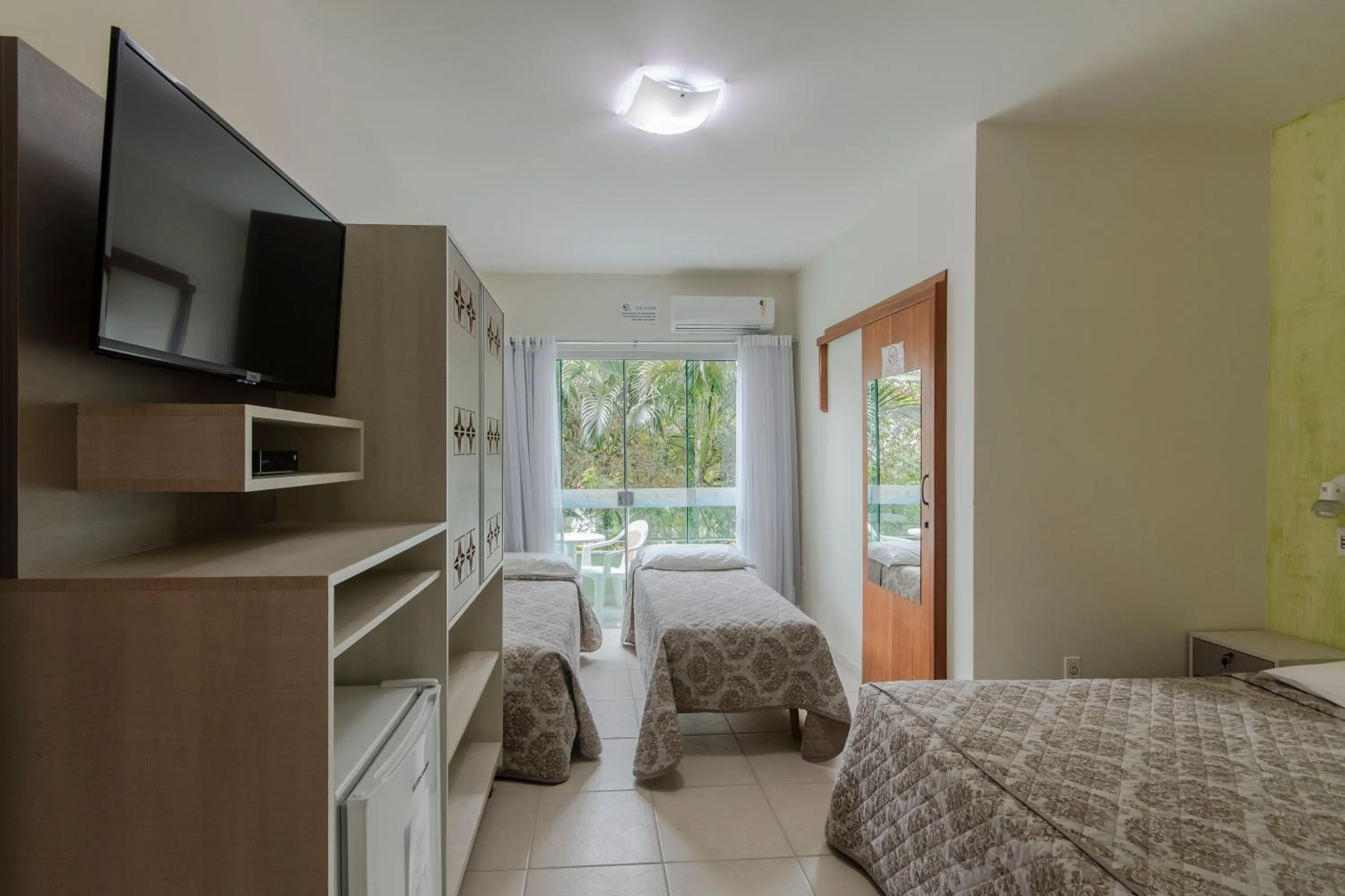 Deluxe Quadruple Room in Hotel Cores do Mar