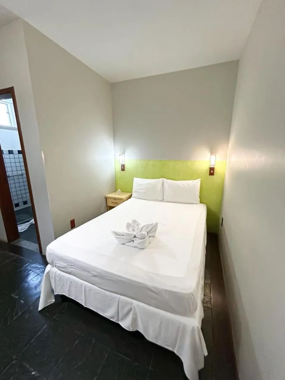 Bed in Pousada Cores do Mar | Conforto com Piscina em Bombinhas