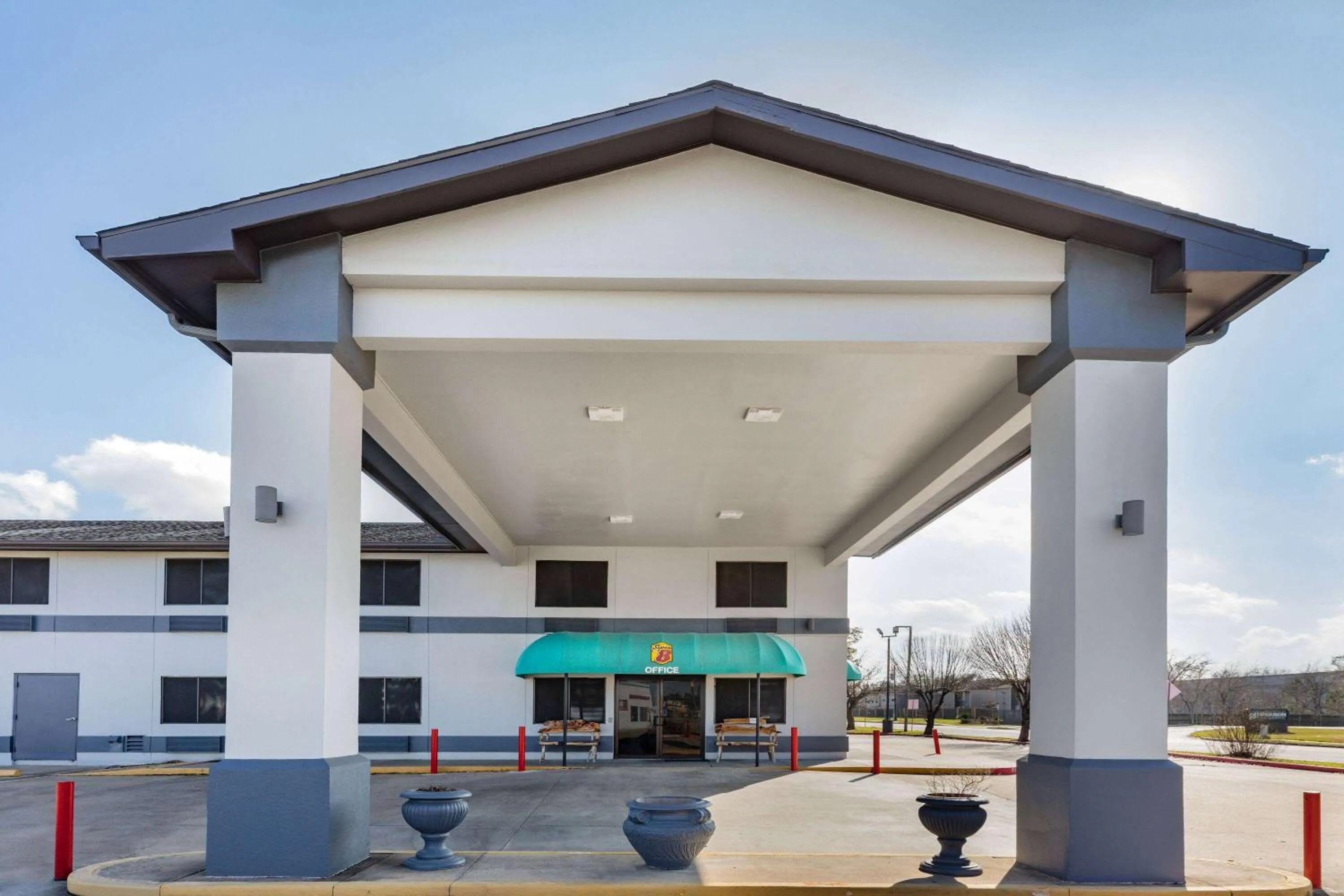 Property building in Super 8 by Wyndham League City Kemah Area