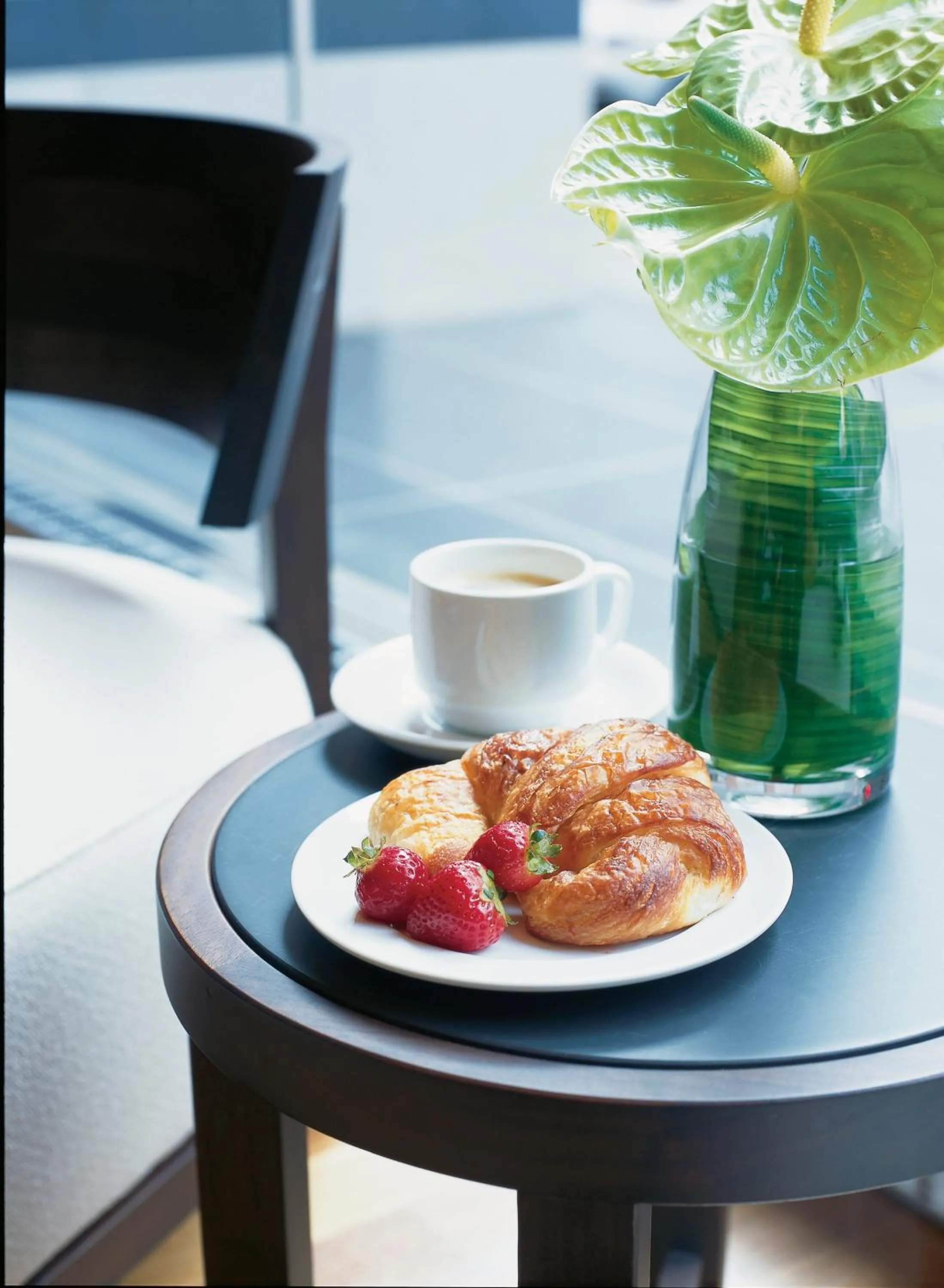 Communal lounge/ TV room in Le Germain Hotel Toronto