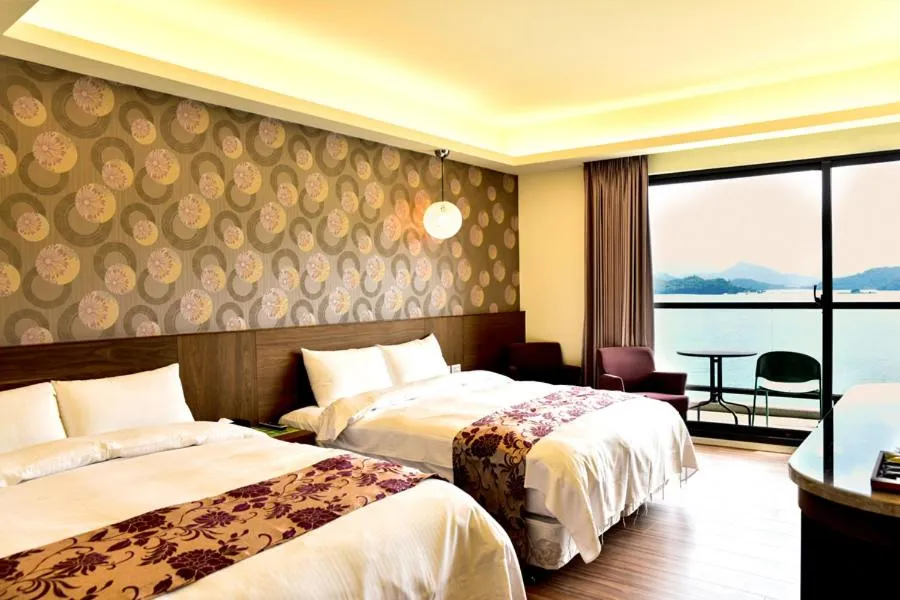 Bed in Miracolo View Hotel