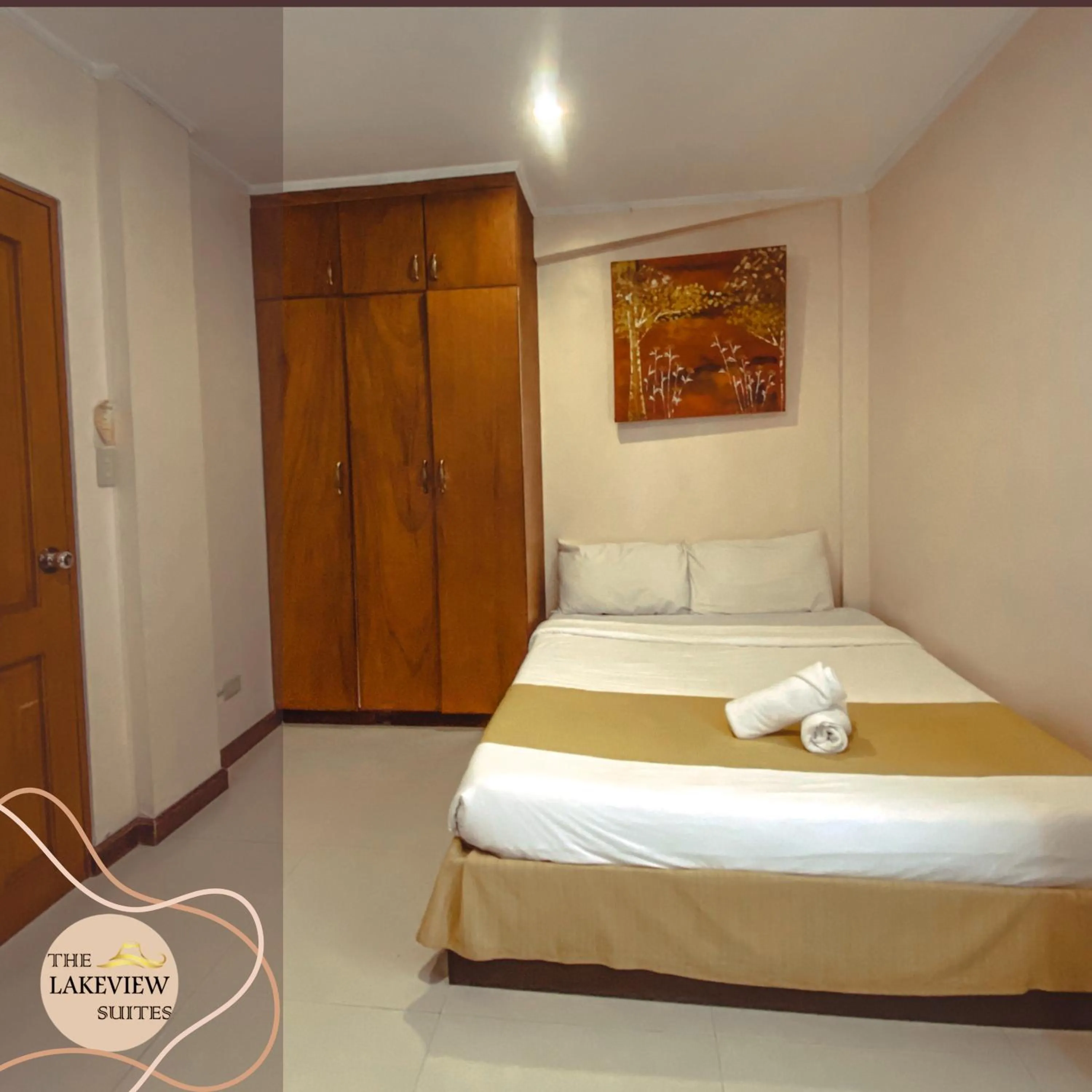 Bed in The Lakeview Suites