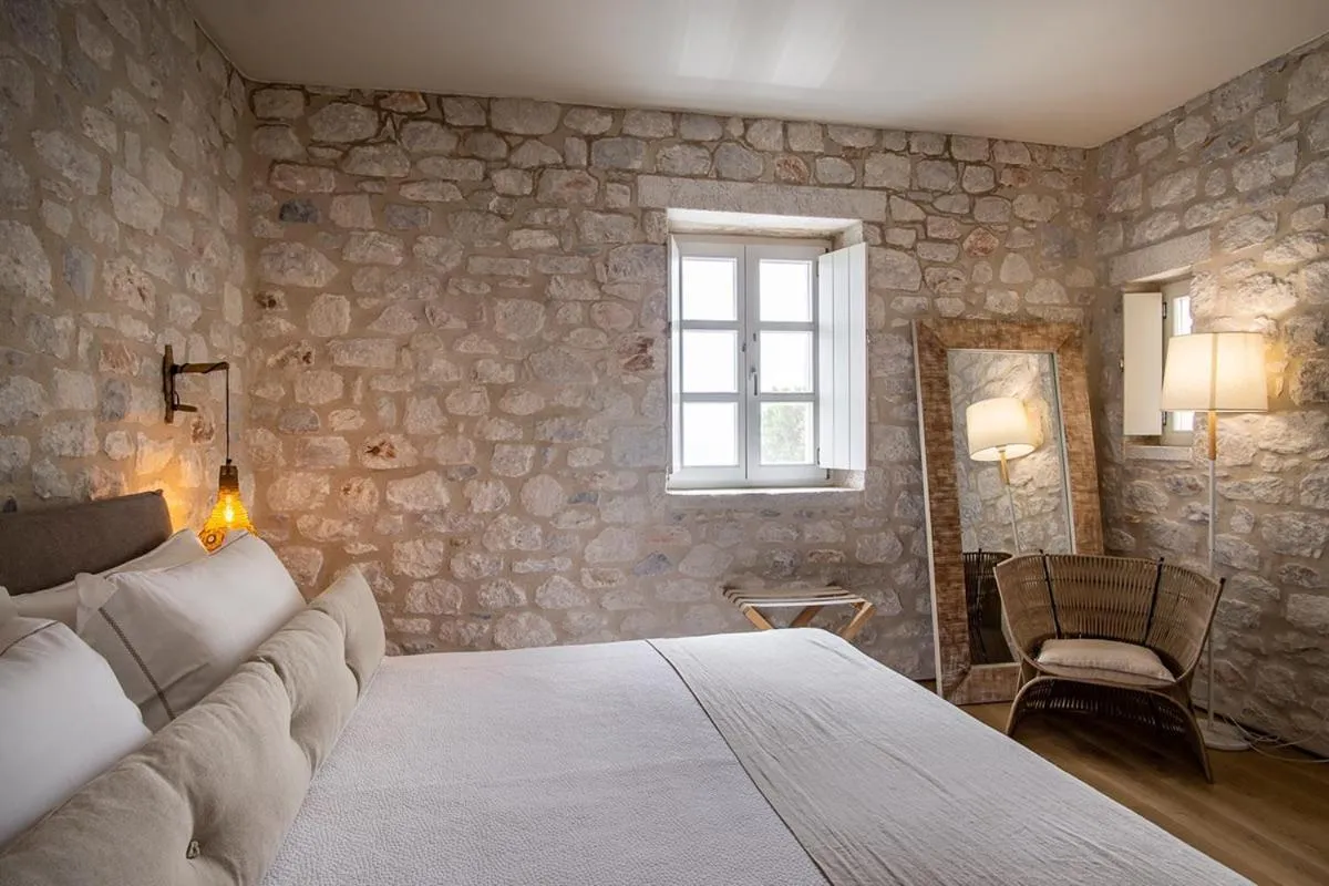 Bed in BASSA MAINA Villas & Suites