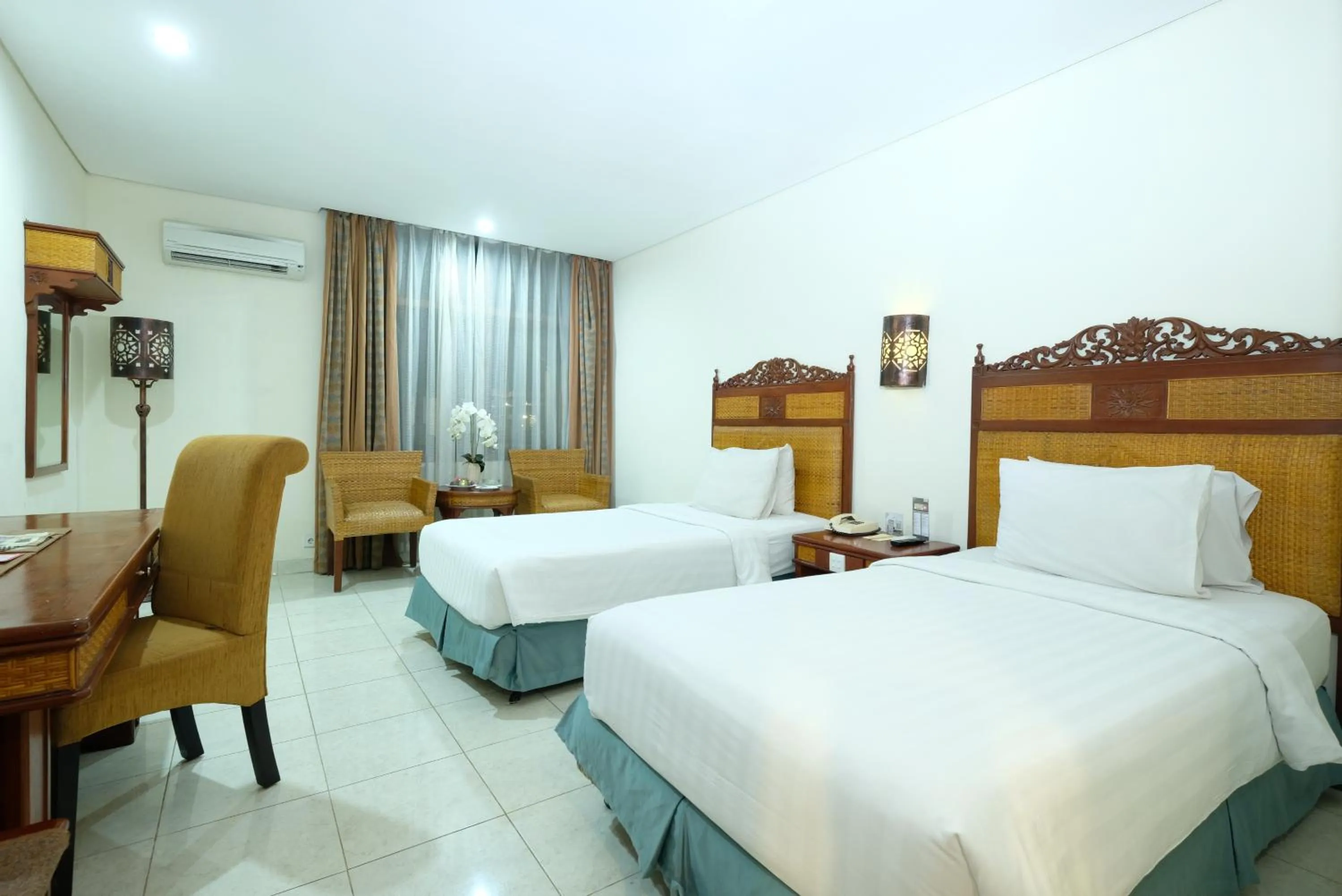 Bed in Kusuma Sahid Prince Hotel Solo