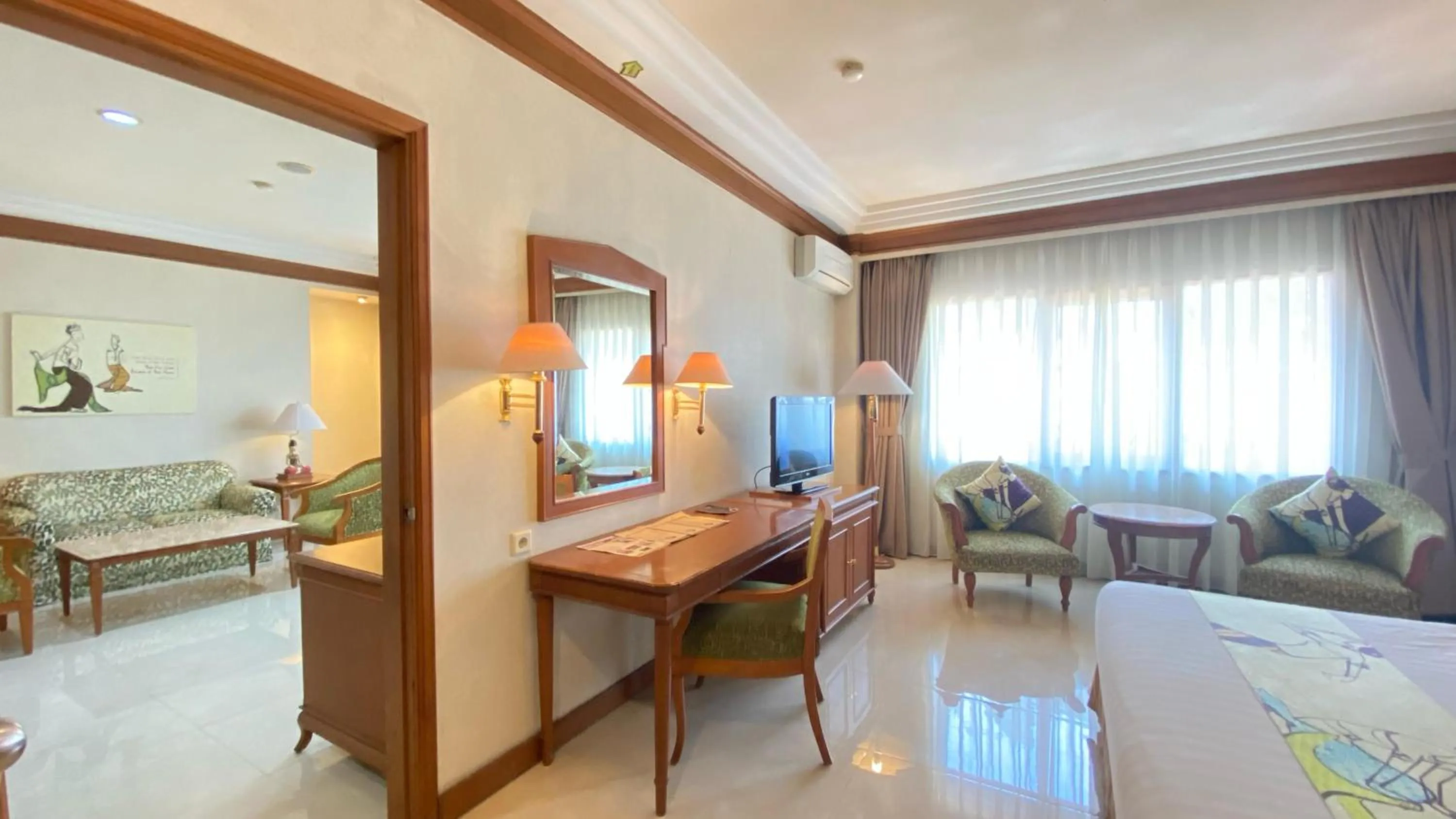 Living room, Bed in Kusuma Sahid Prince Hotel Solo