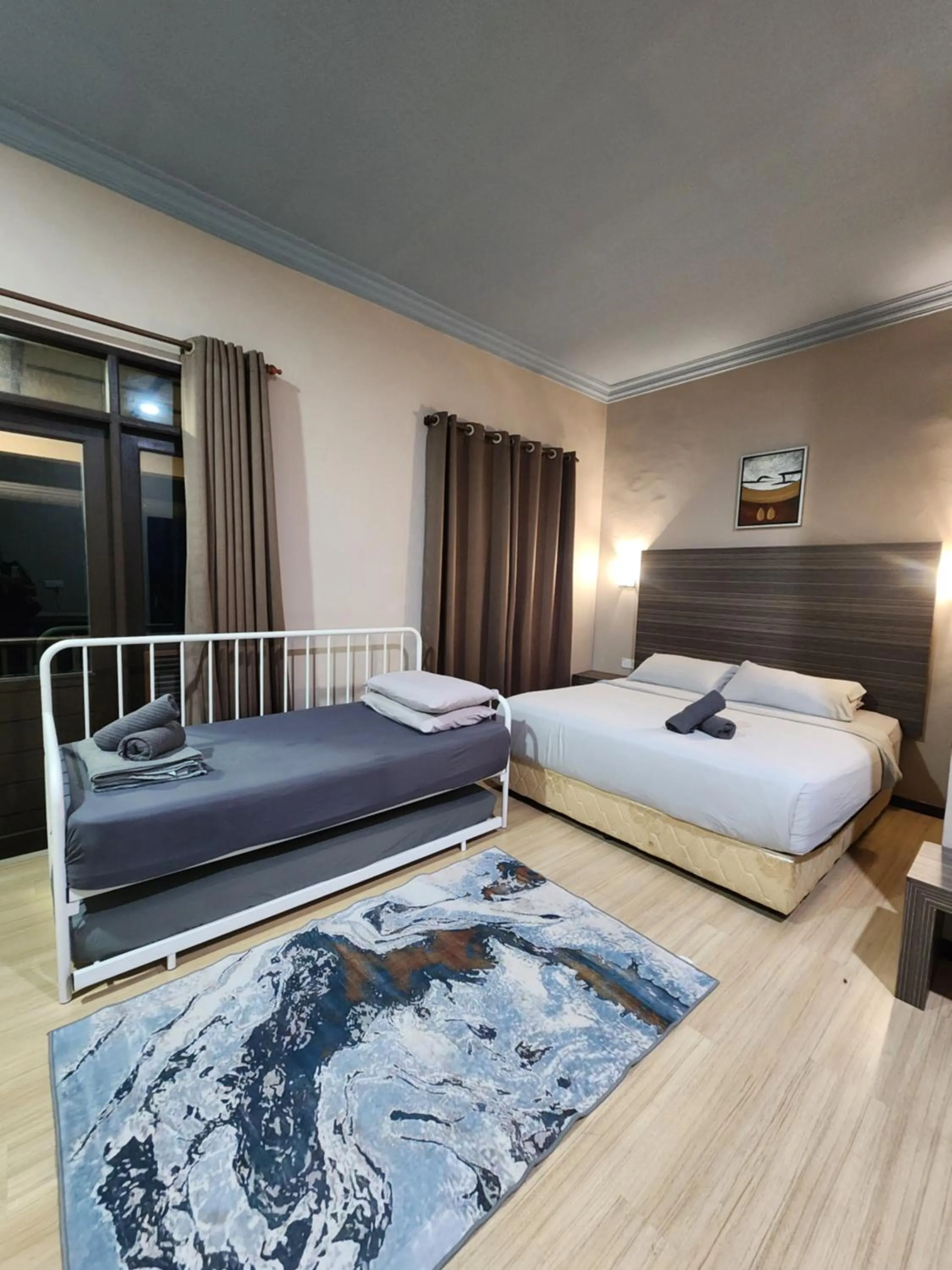 Bed in Pandan Laut Beach Resort