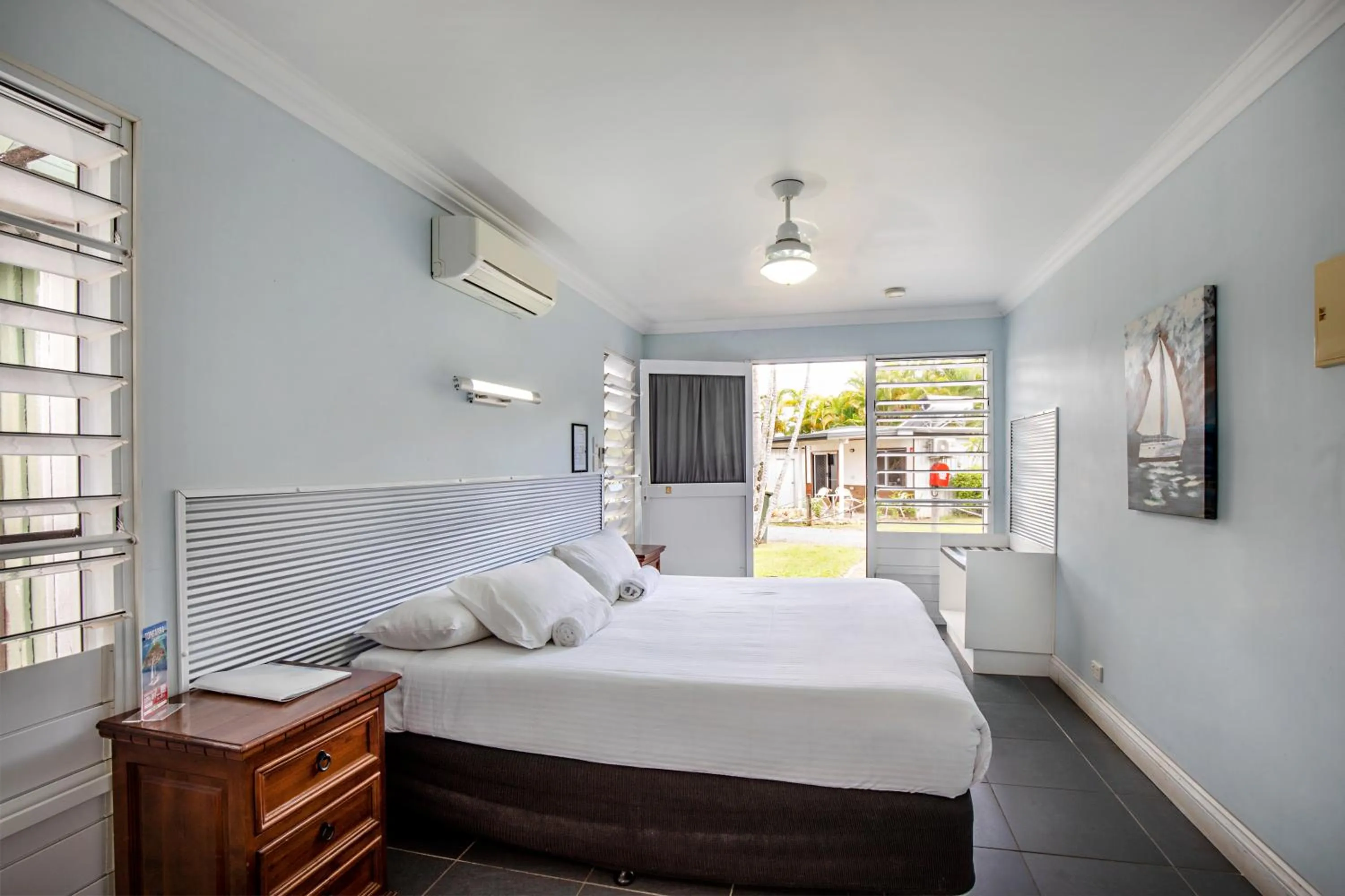 Bed in Bush Village Holiday Cabins