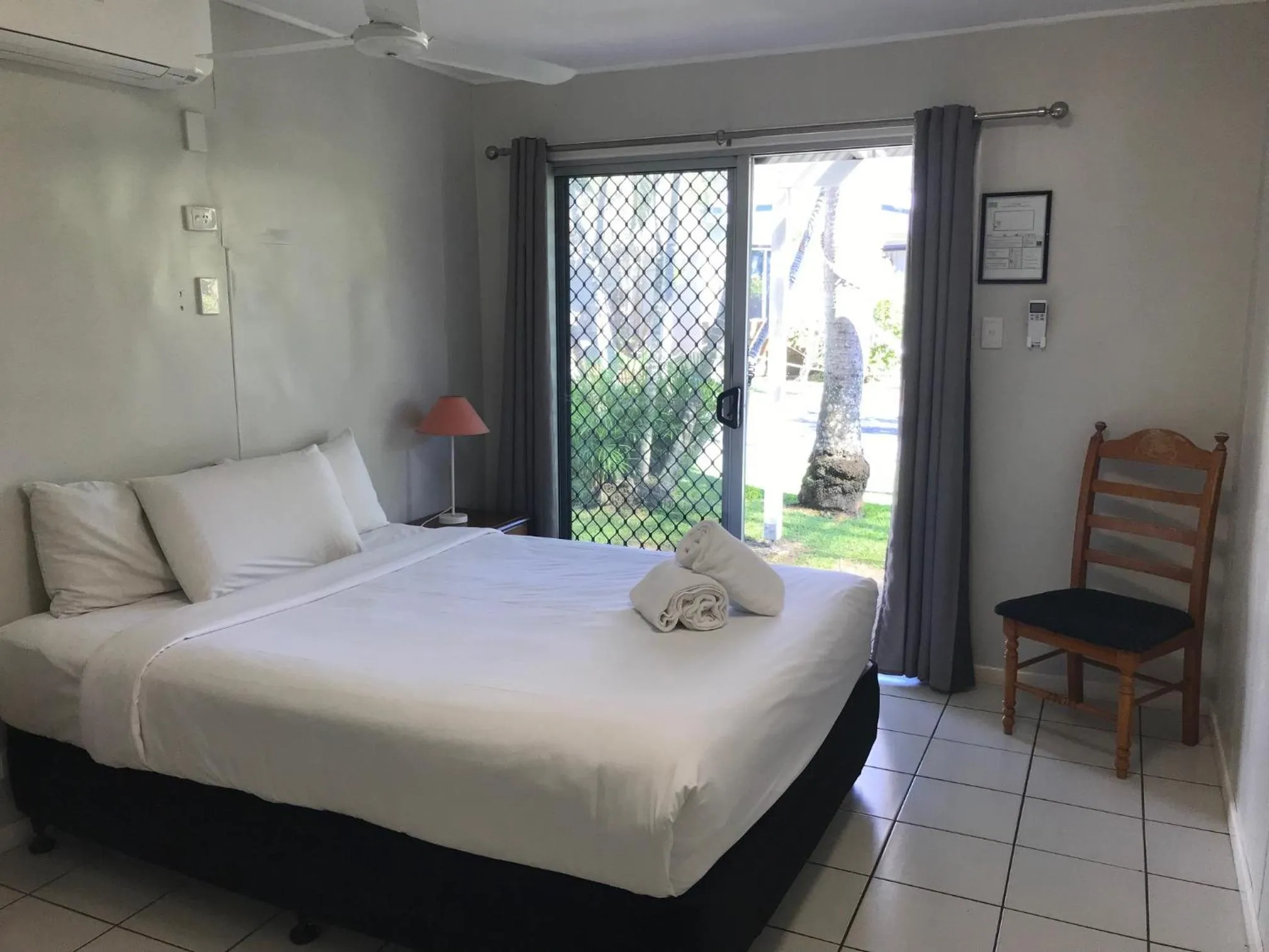 Bed in Bush Village Holiday Cabins