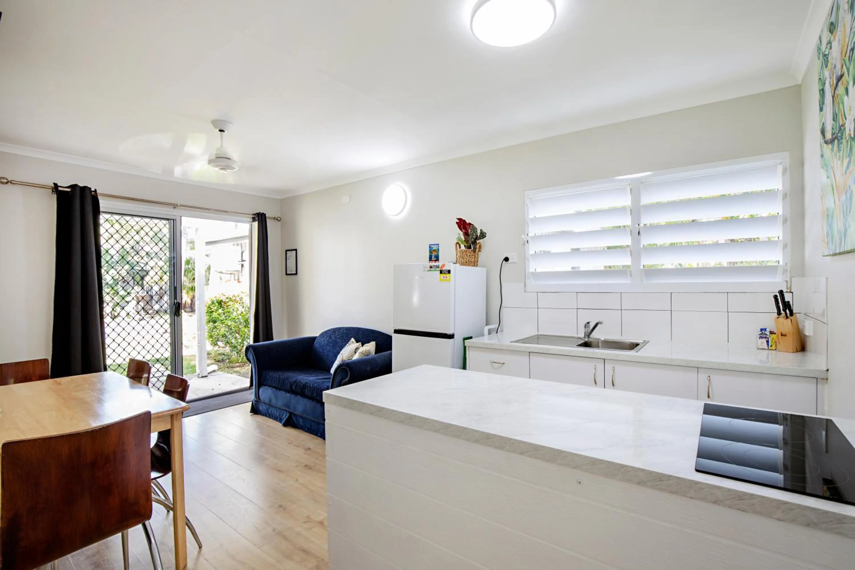 Living room in Bush Village Holiday Cabins