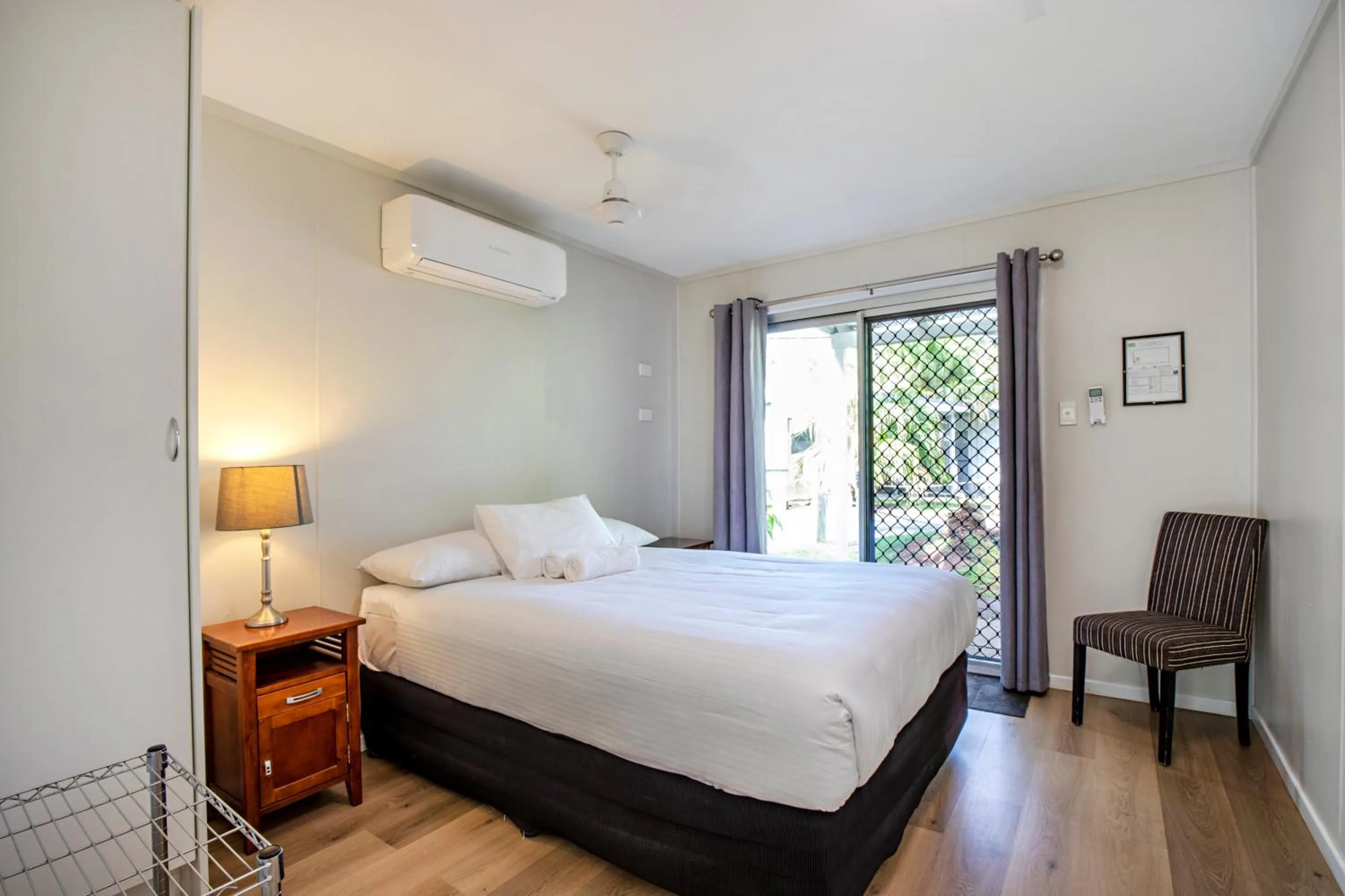 Bedroom, Bed in Bush Village Holiday Cabins