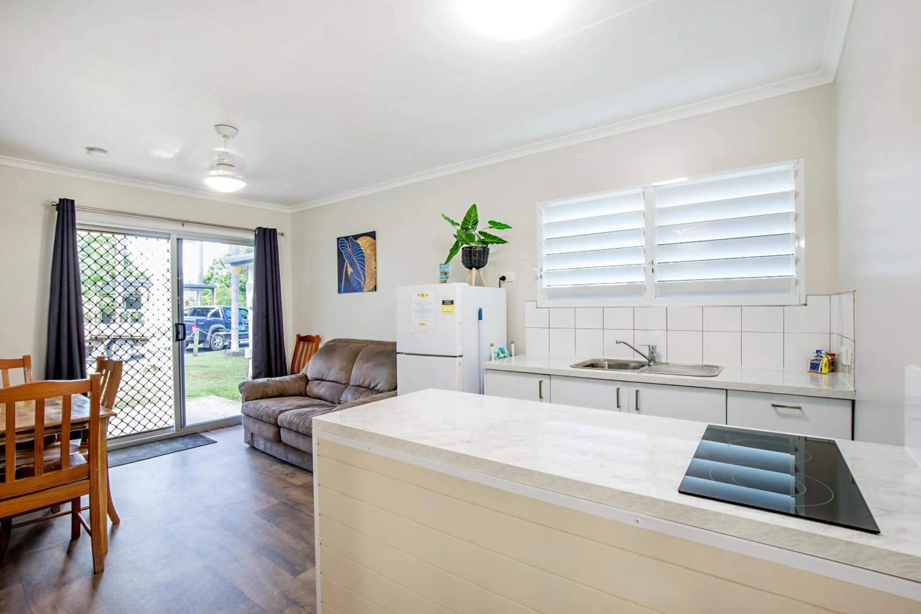 Kitchen or kitchenette in Bush Village Holiday Cabins