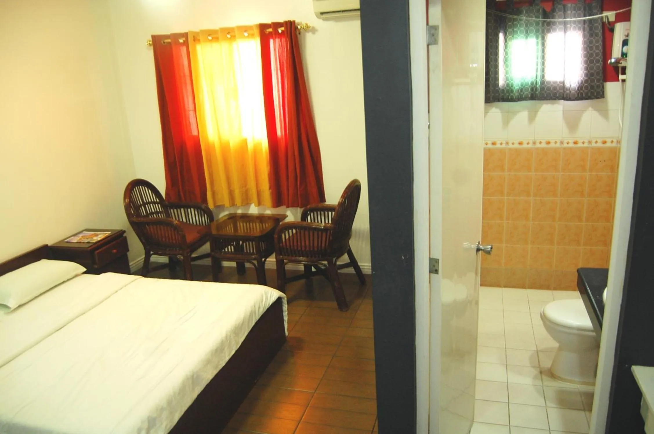 Bedroom in Rumi Apartelle Hotel