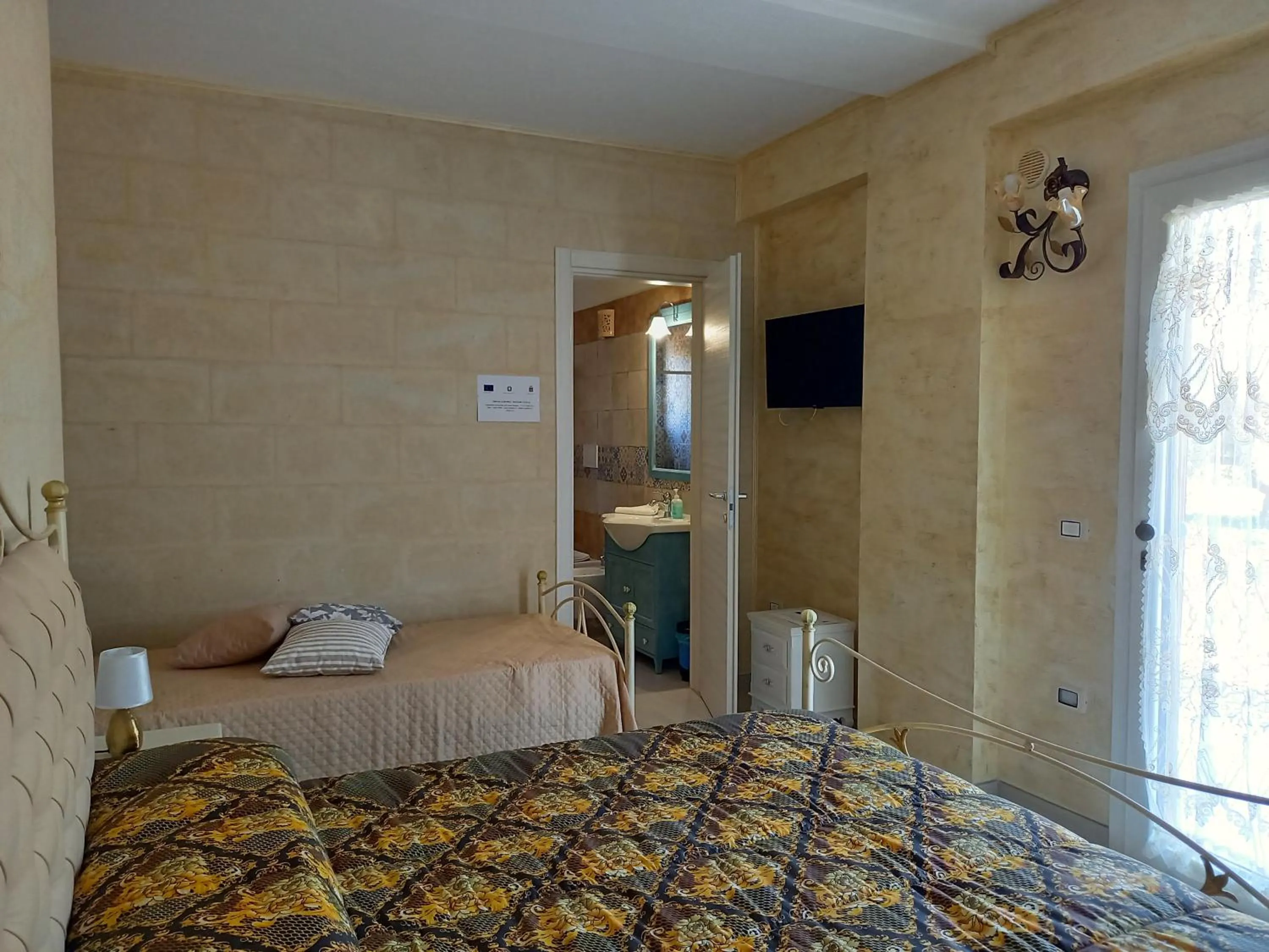 Bed in B&B Giardino Isabella