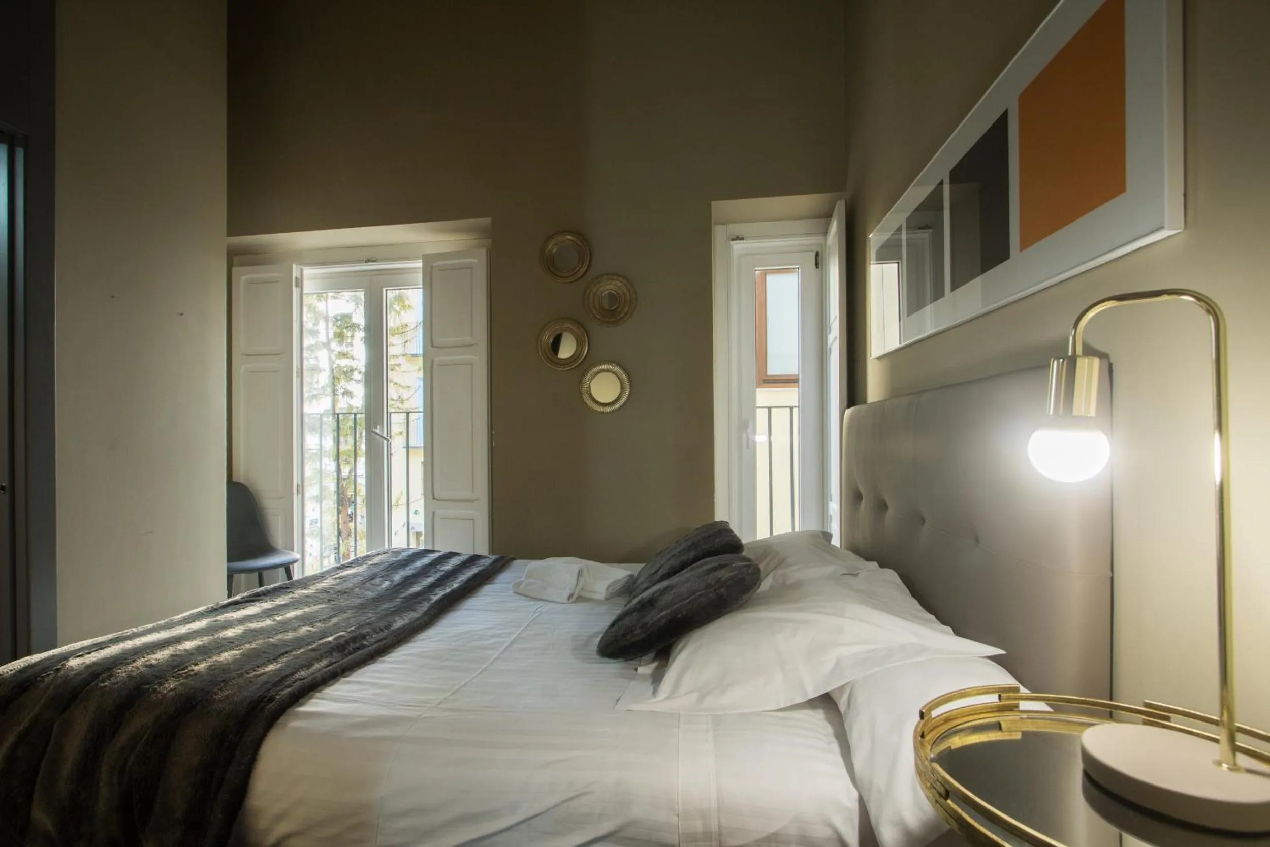 Bed in Cosy Rooms Tapinería