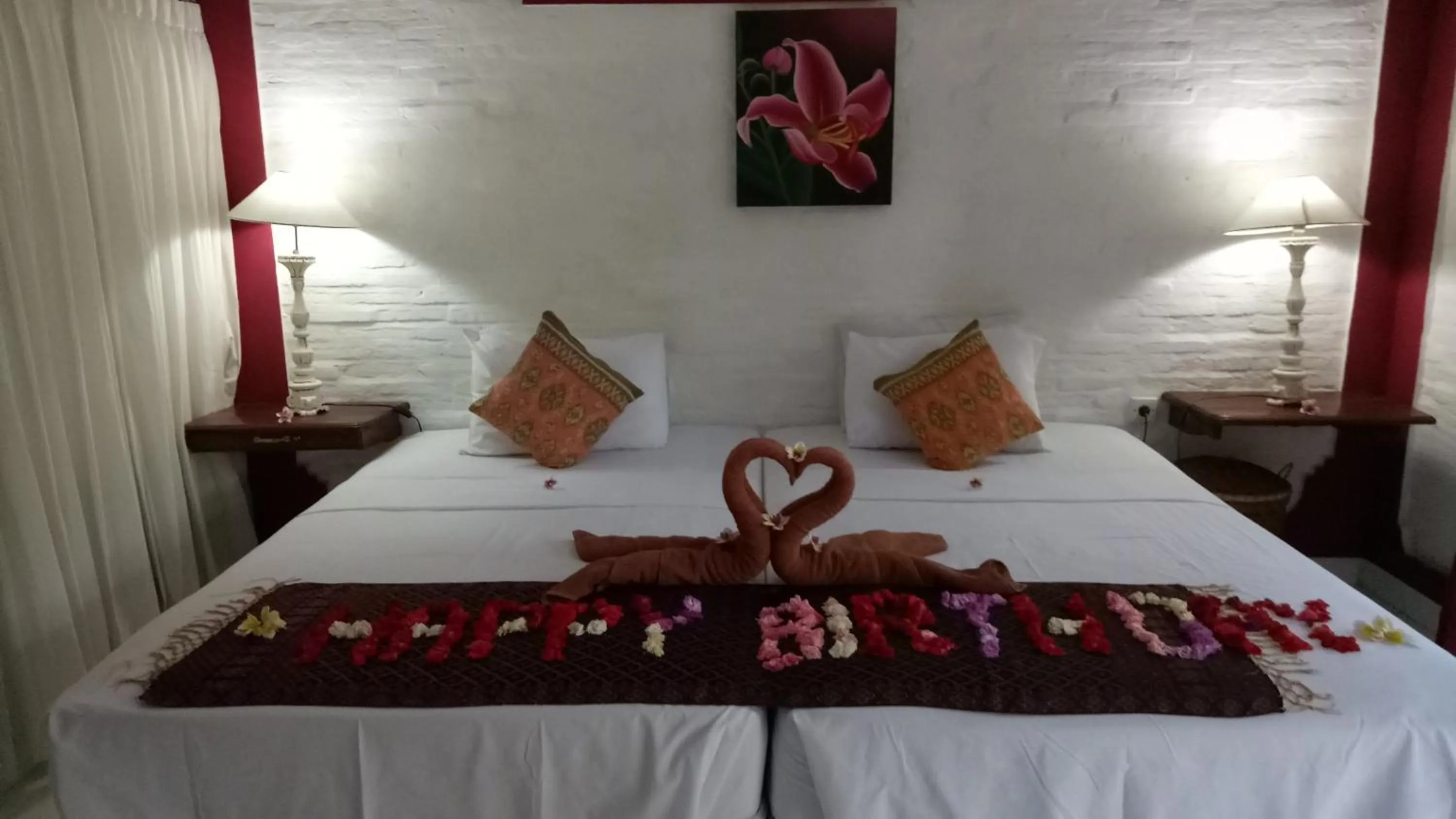 Bed in Puri Oka Beach Bungalows