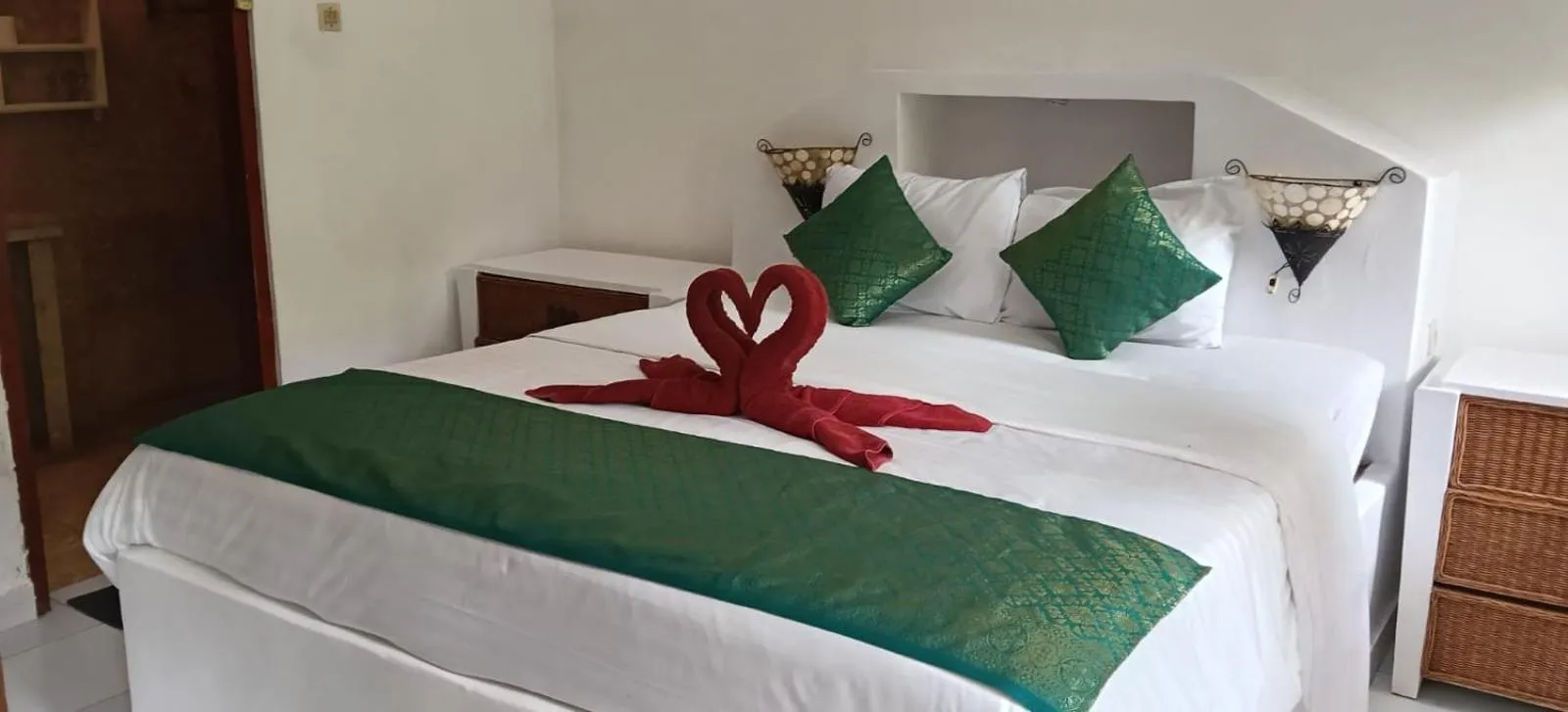 Bed in Puri Oka Beach Bungalows